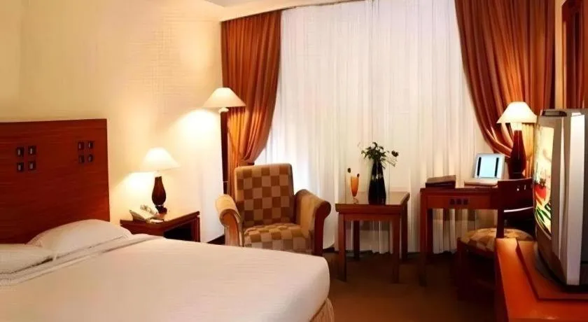 Bed in Oasis Amir Hotel