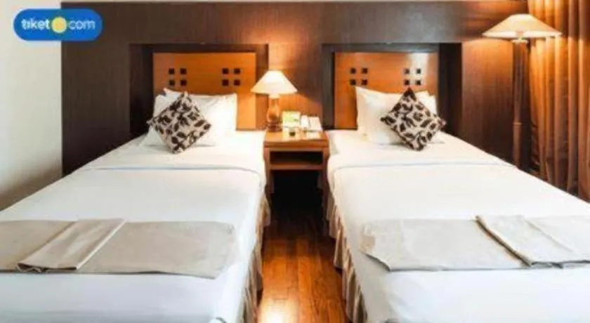 Bed in Oasis Amir Hotel