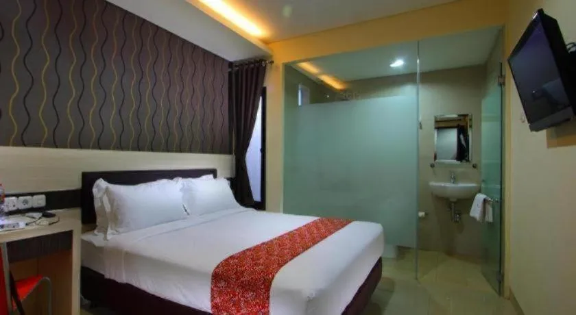 Bed in Sumi Hotel Simpang Lima Semarang