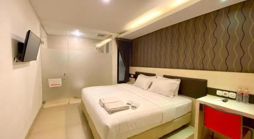 Bed in Sumi Hotel Simpang Lima Semarang