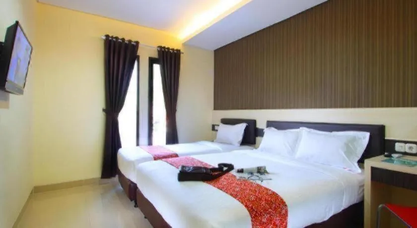 Bed in Sumi Hotel Simpang Lima Semarang