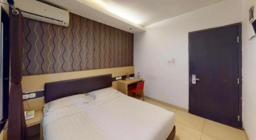 Bed in Sumi Hotel Simpang Lima Semarang