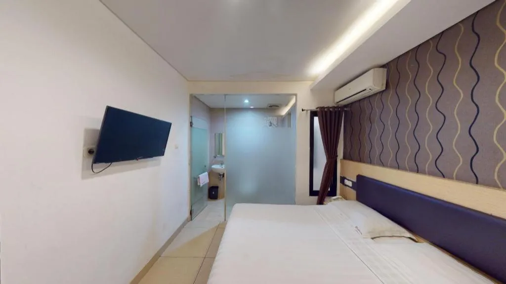 Bed in Sumi Hotel Simpang Lima Semarang