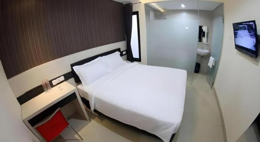 Bed in Sumi Hotel Simpang Lima Semarang