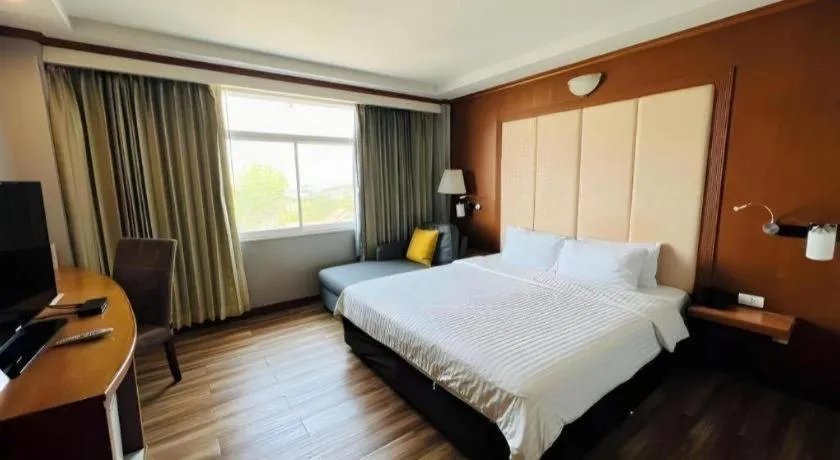 Bed in Western Grand Hotel Ratchaburi