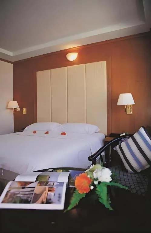 Bed in Western Grand Hotel Ratchaburi