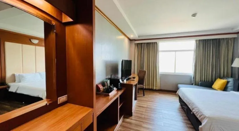 Bed in Western Grand Hotel Ratchaburi