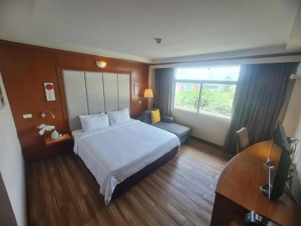 Bed in Western Grand Hotel Ratchaburi