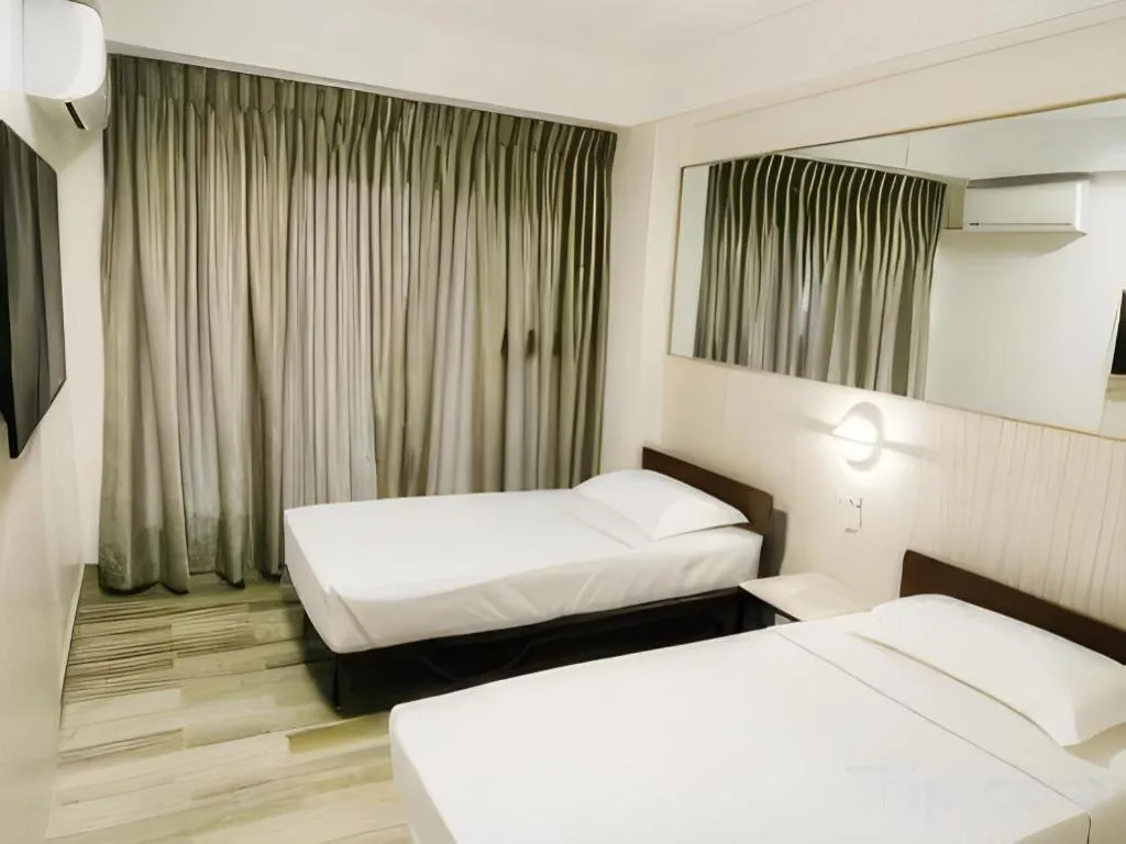 Bed in Travelite Express Hotel