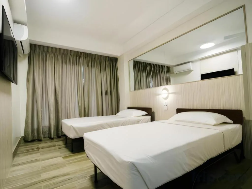 Bed in Travelite Express Hotel
