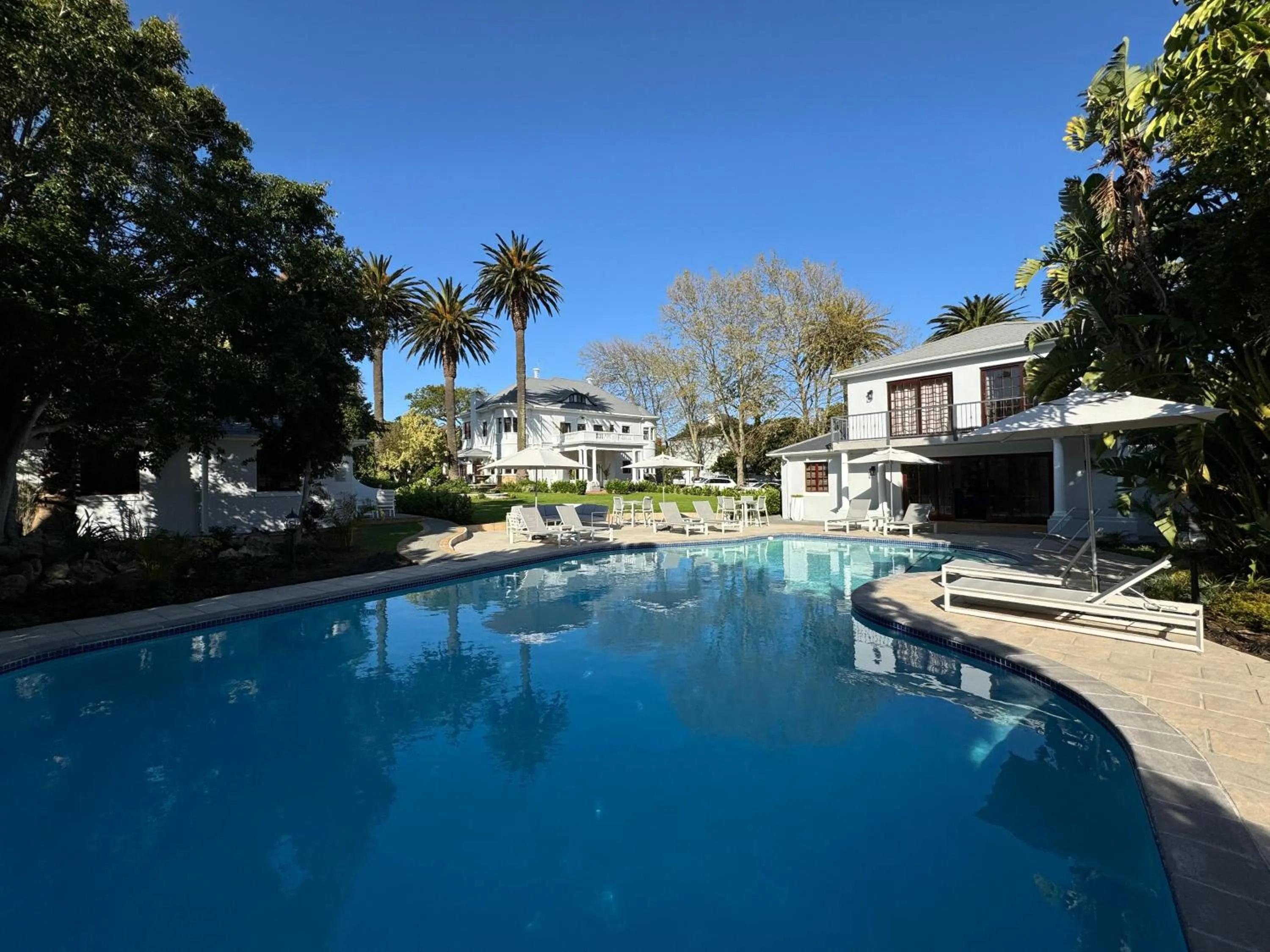 Swimming pool in Palm House Boutique Hotel and Spa