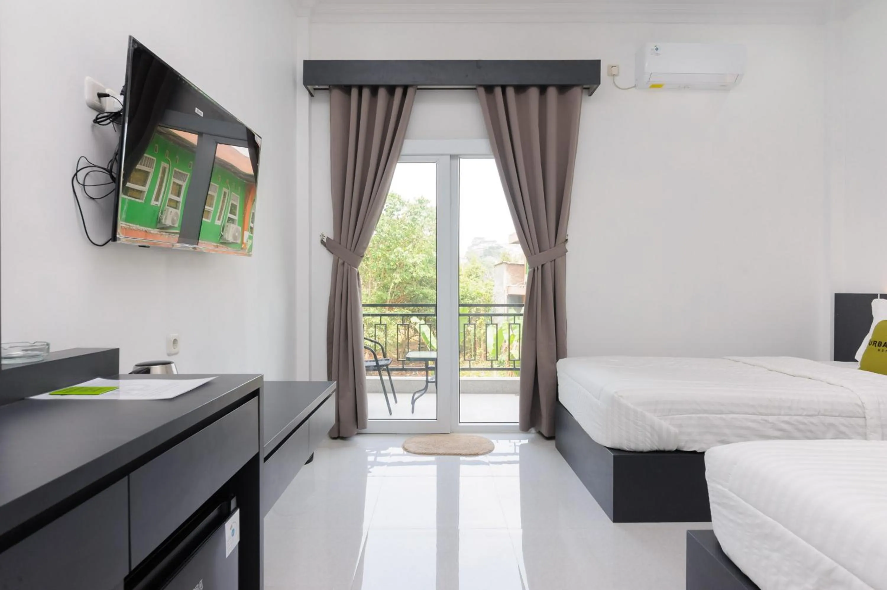 Bedroom, Bed in Urbanview Hotel AnD Lampung by RedDoorz