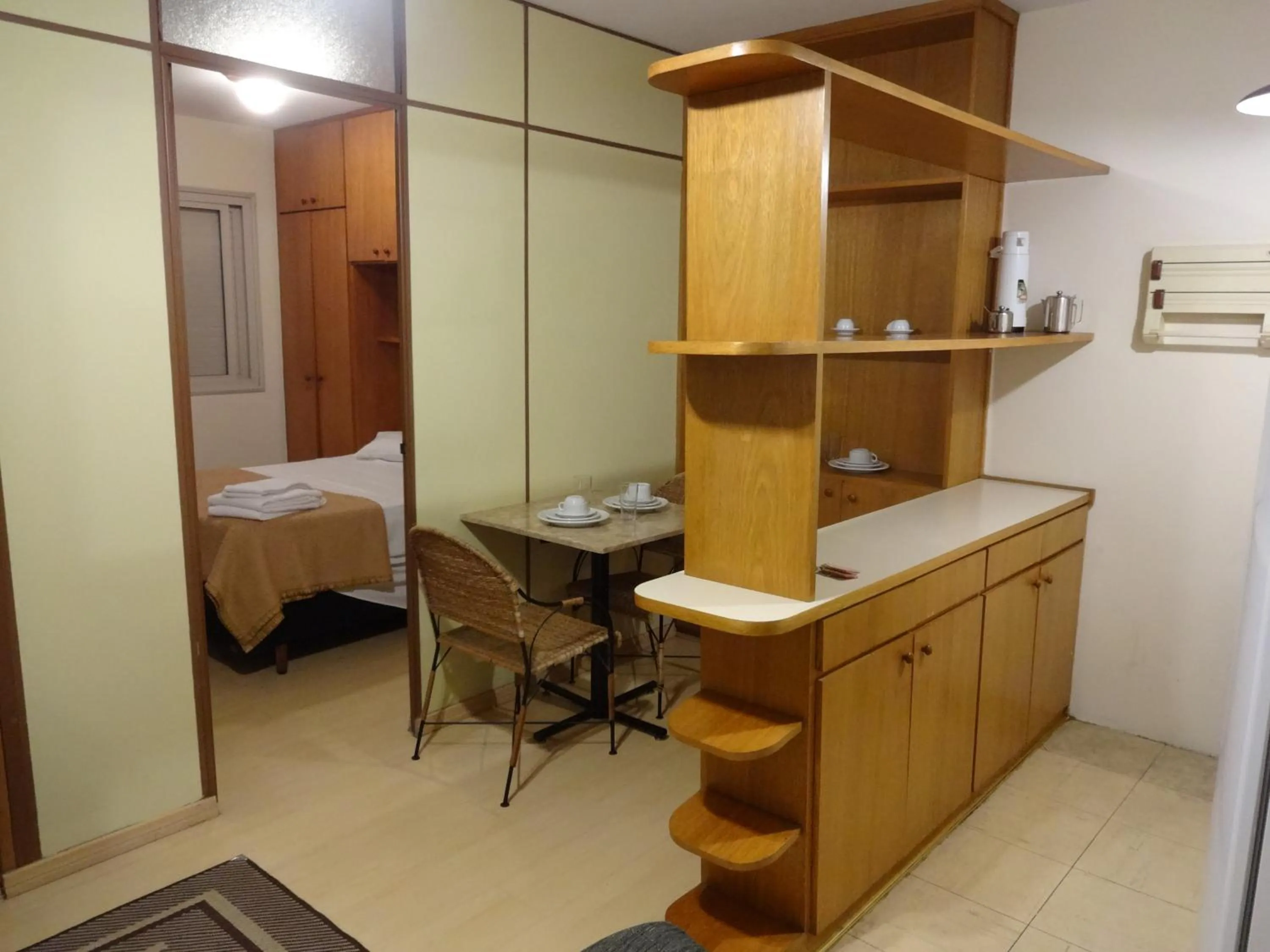 Kitchen or kitchenette, Bed in Residencial Genéve