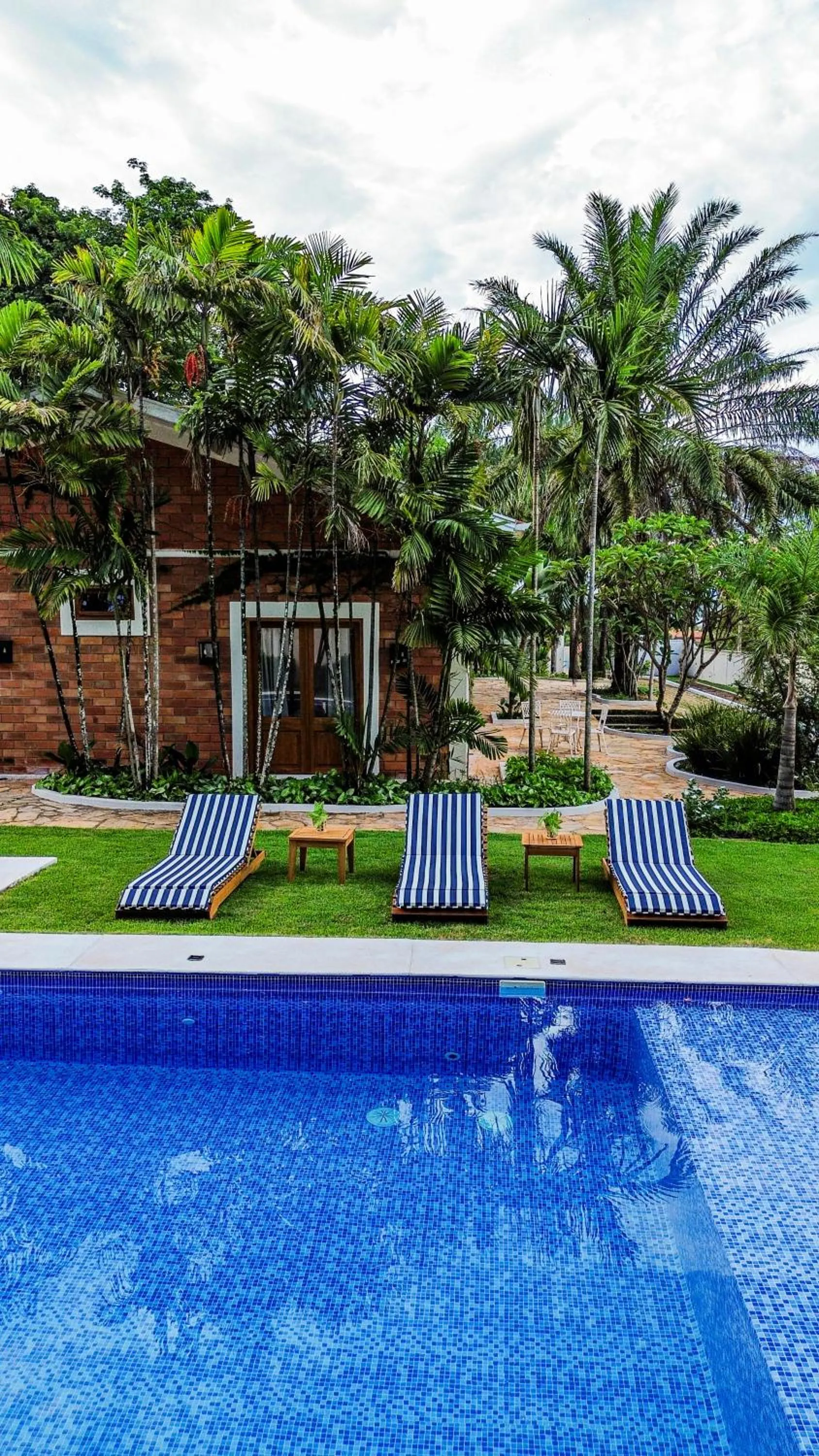 Swimming pool in Pousada Manacá Exclusive Suítes