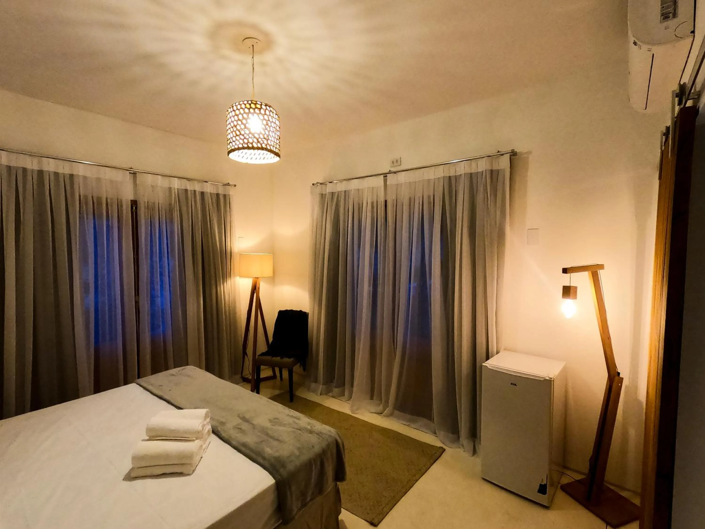 Photo of the whole room, Bed in Pousada Manacá Exclusive Suítes