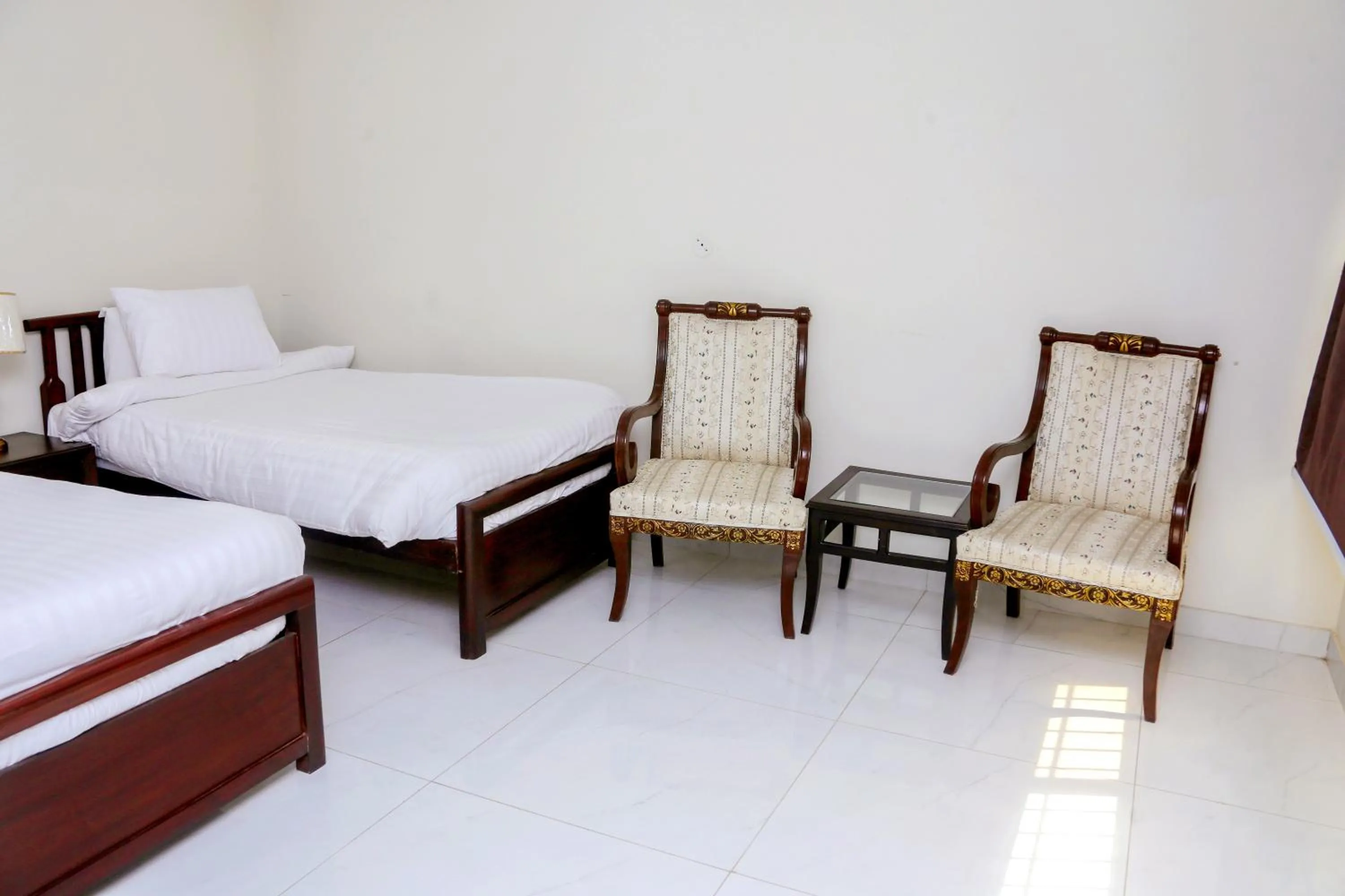 Bed in Gulberg Suites