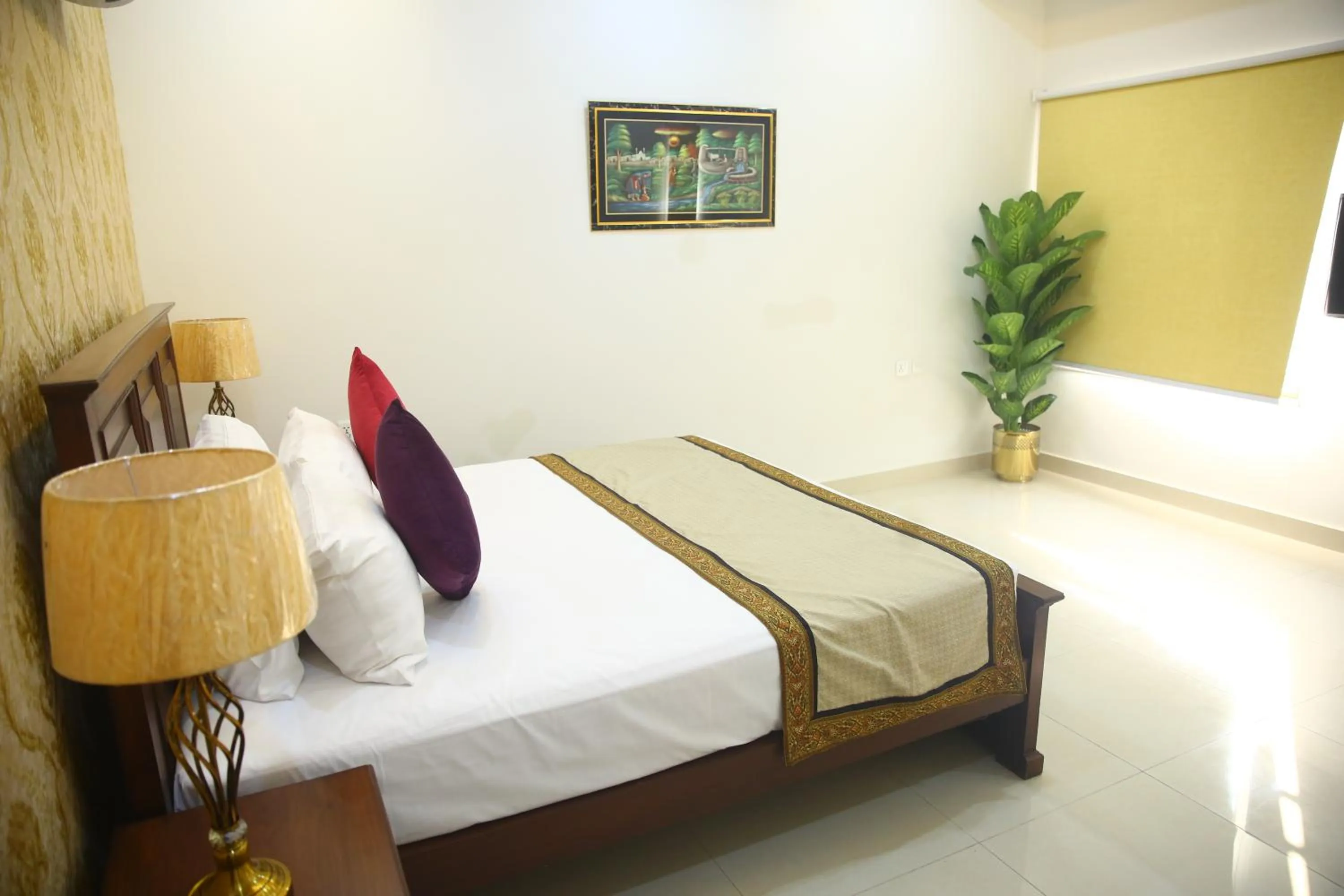 Bed in Gulberg Suites