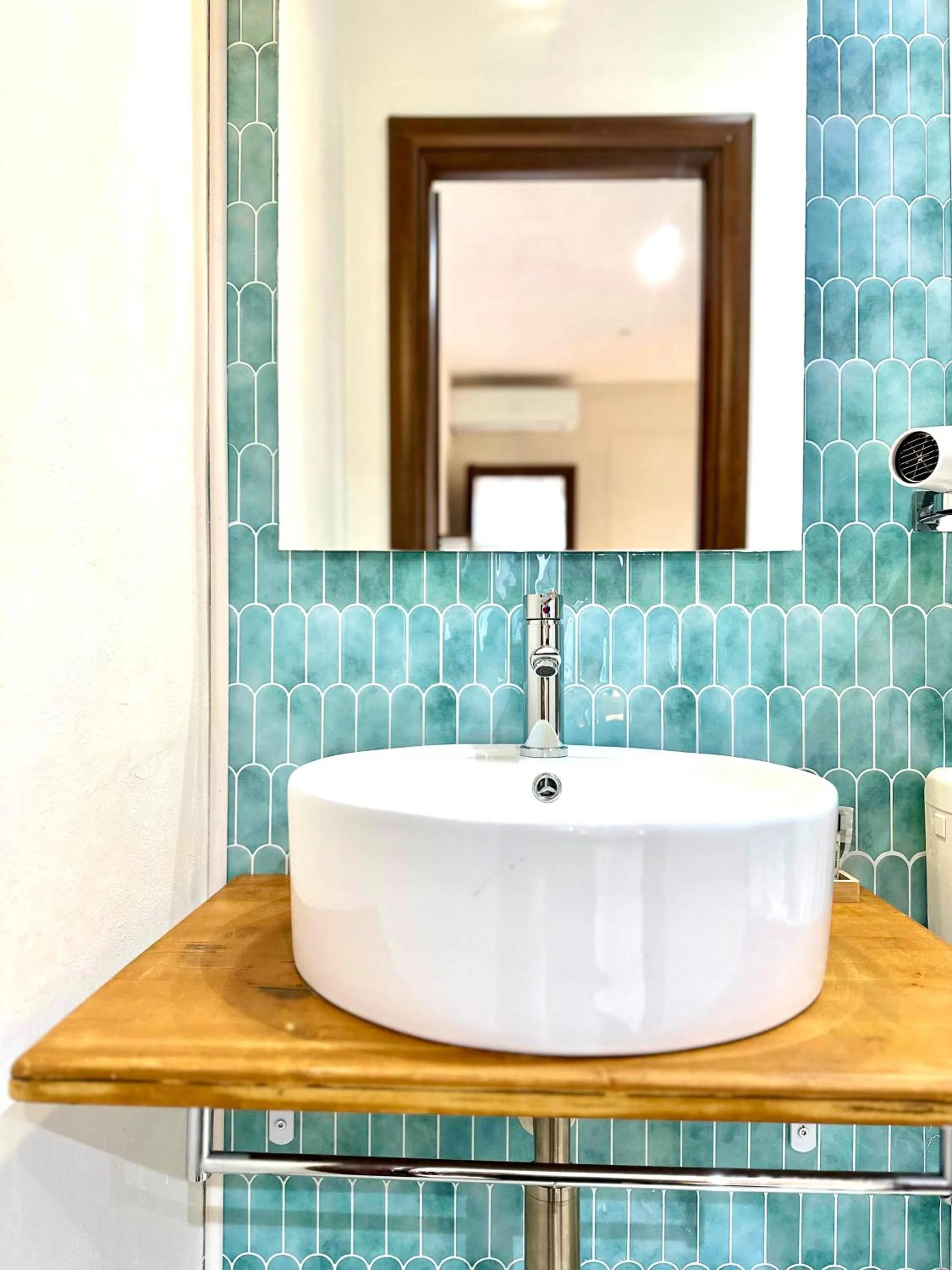 Bathroom in B&B Eyexei Domus