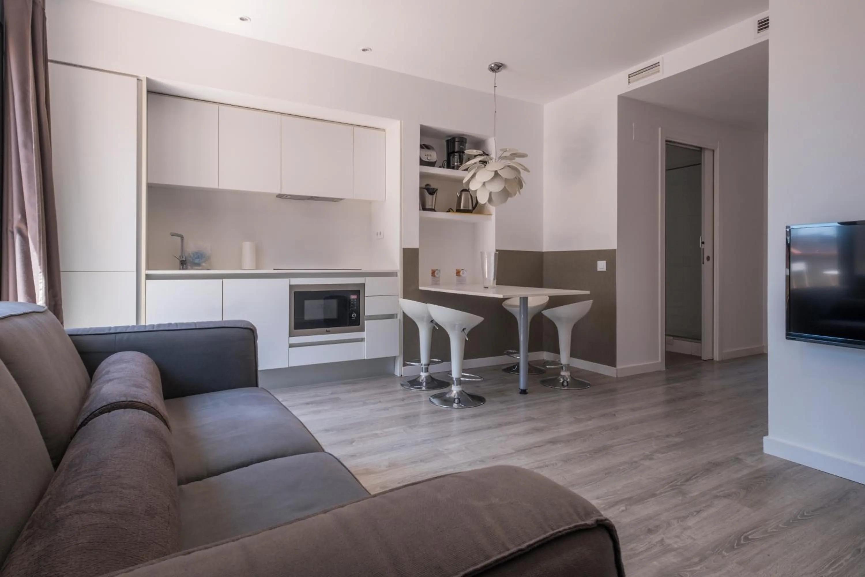 Kitchen or kitchenette in Habitat Apartments ADN