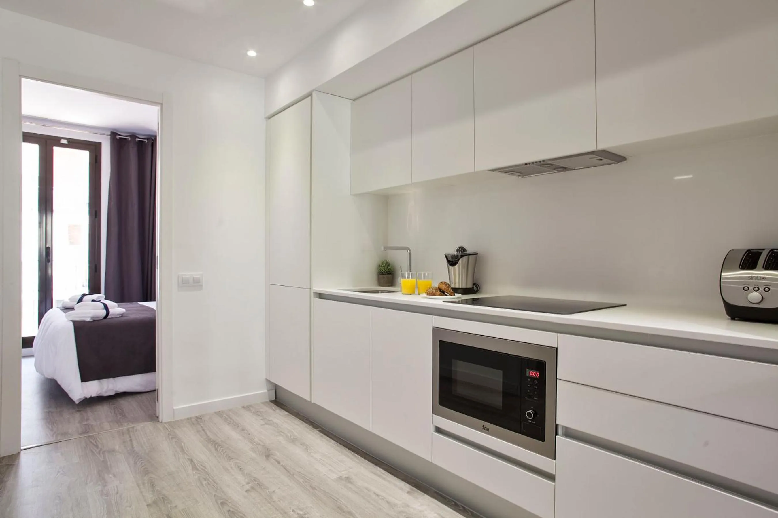 Kitchen or kitchenette in Habitat Apartments ADN