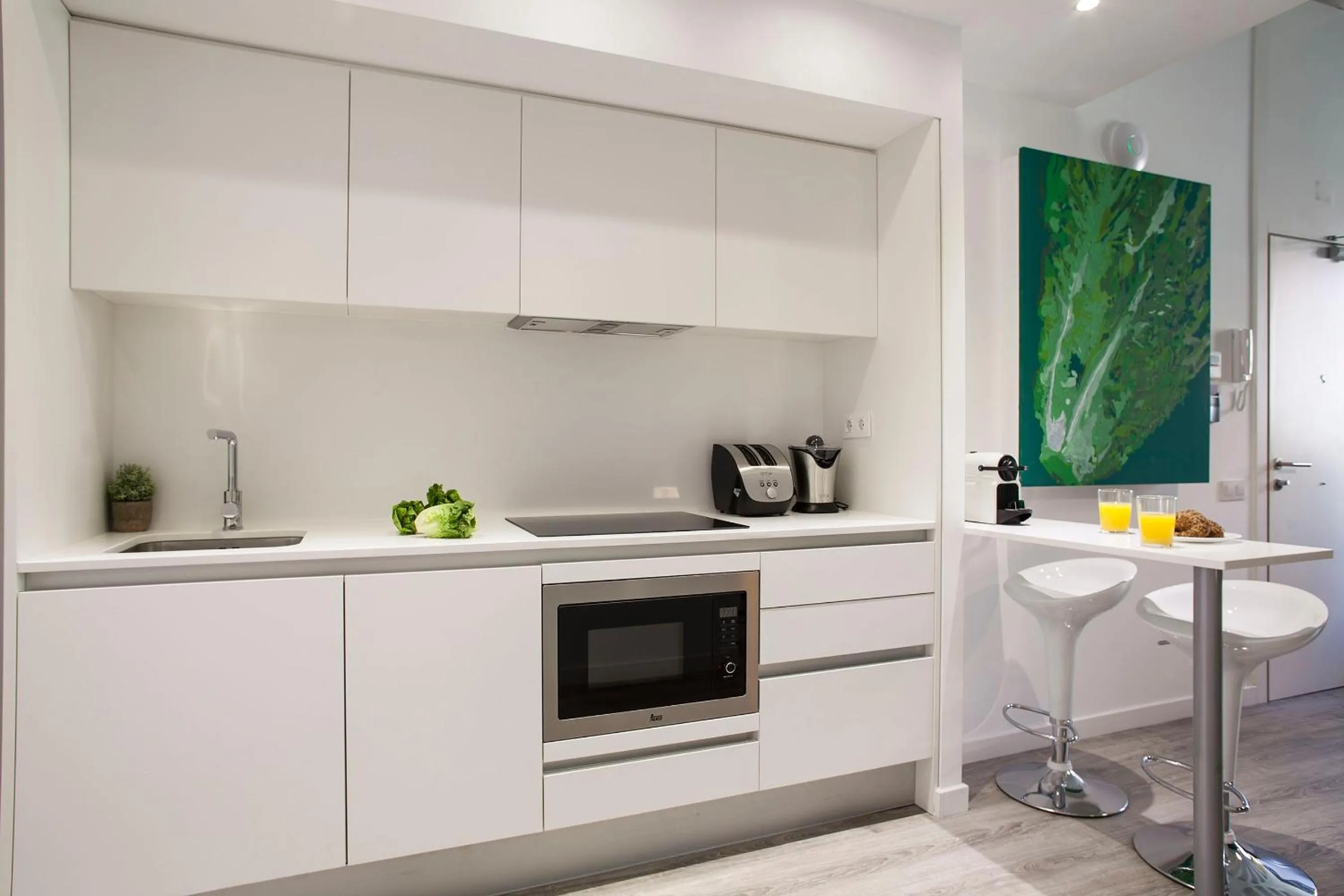 Kitchen or kitchenette in Habitat Apartments ADN