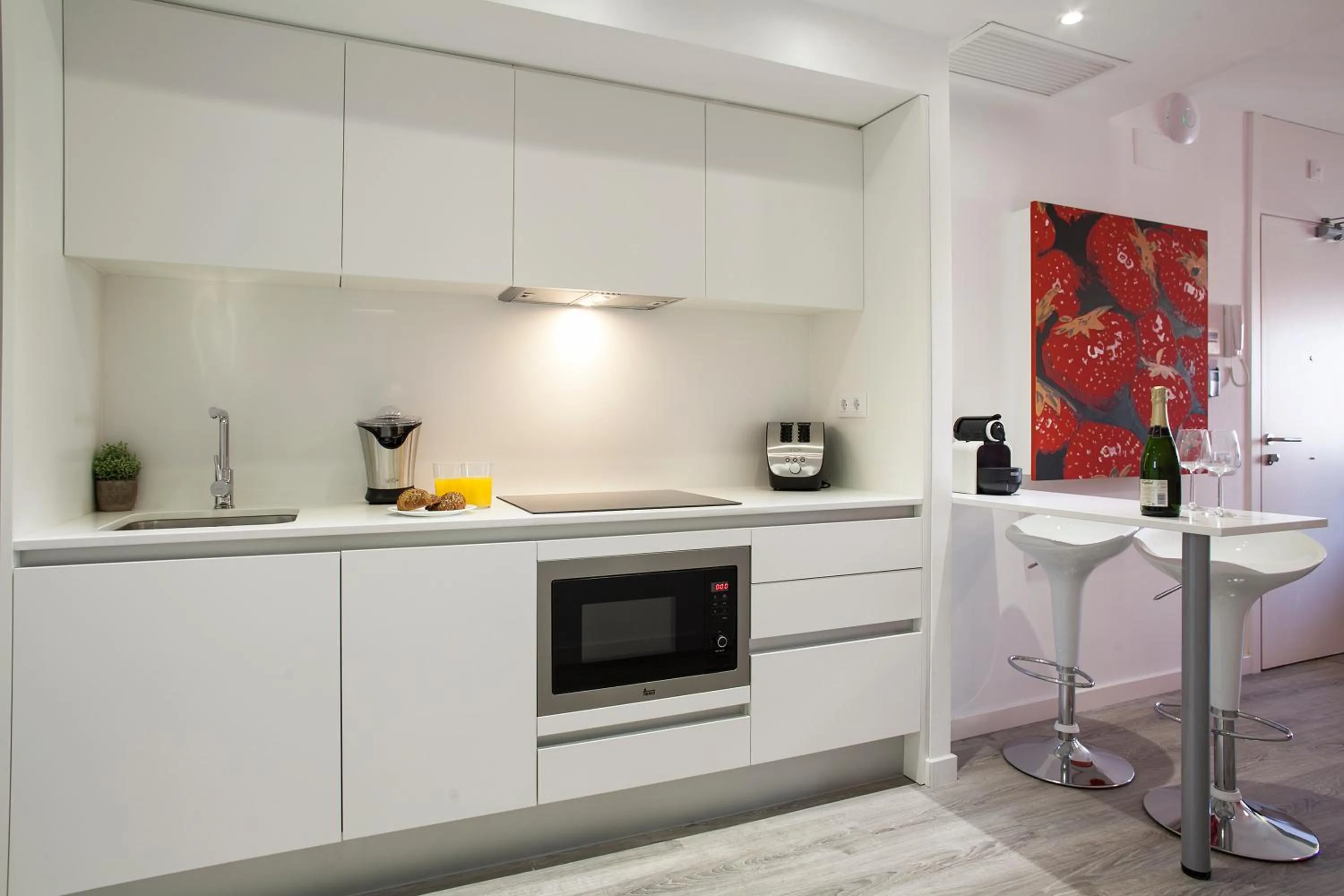 Kitchen or kitchenette in Habitat Apartments ADN