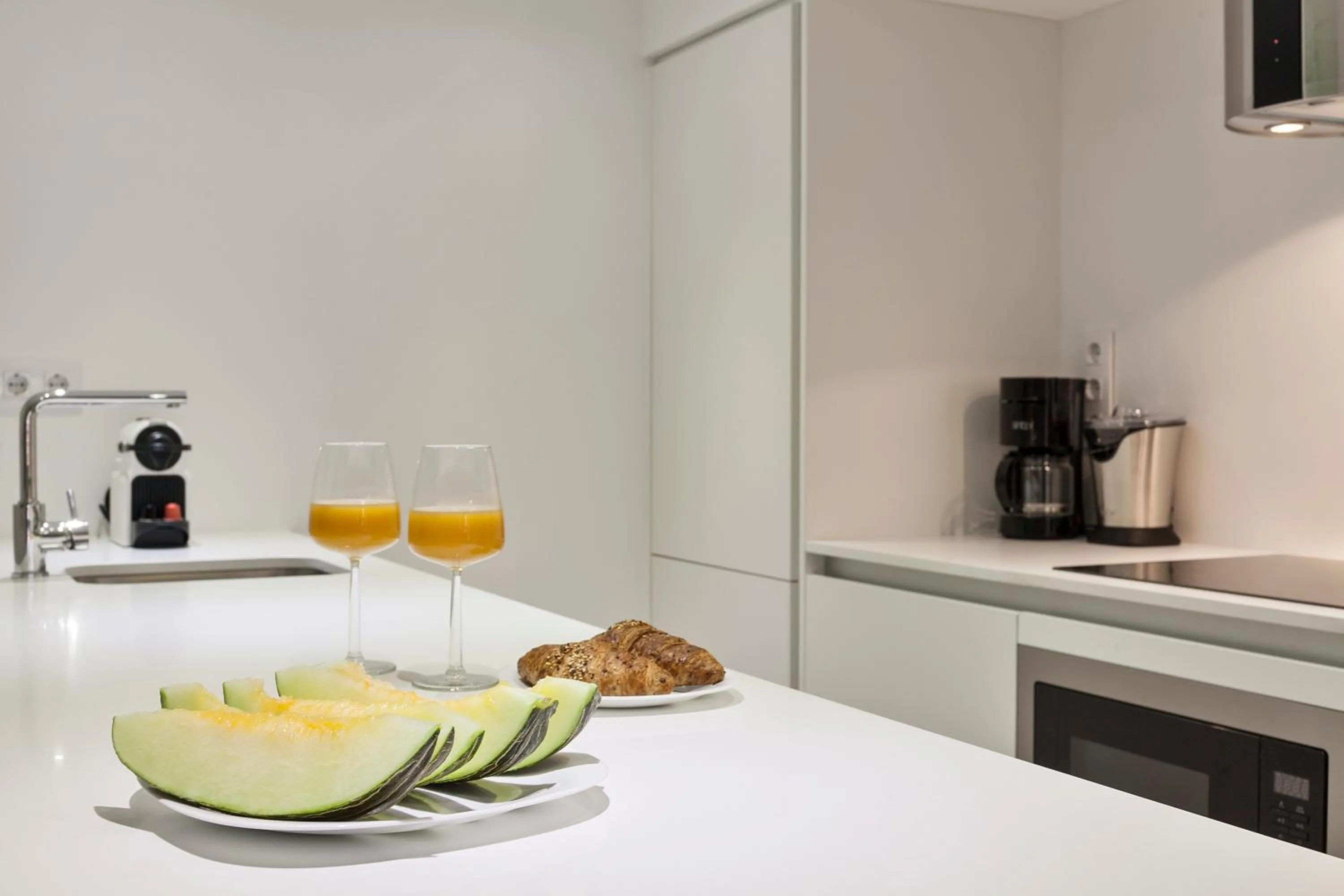 Kitchen or kitchenette in Habitat Apartments ADN