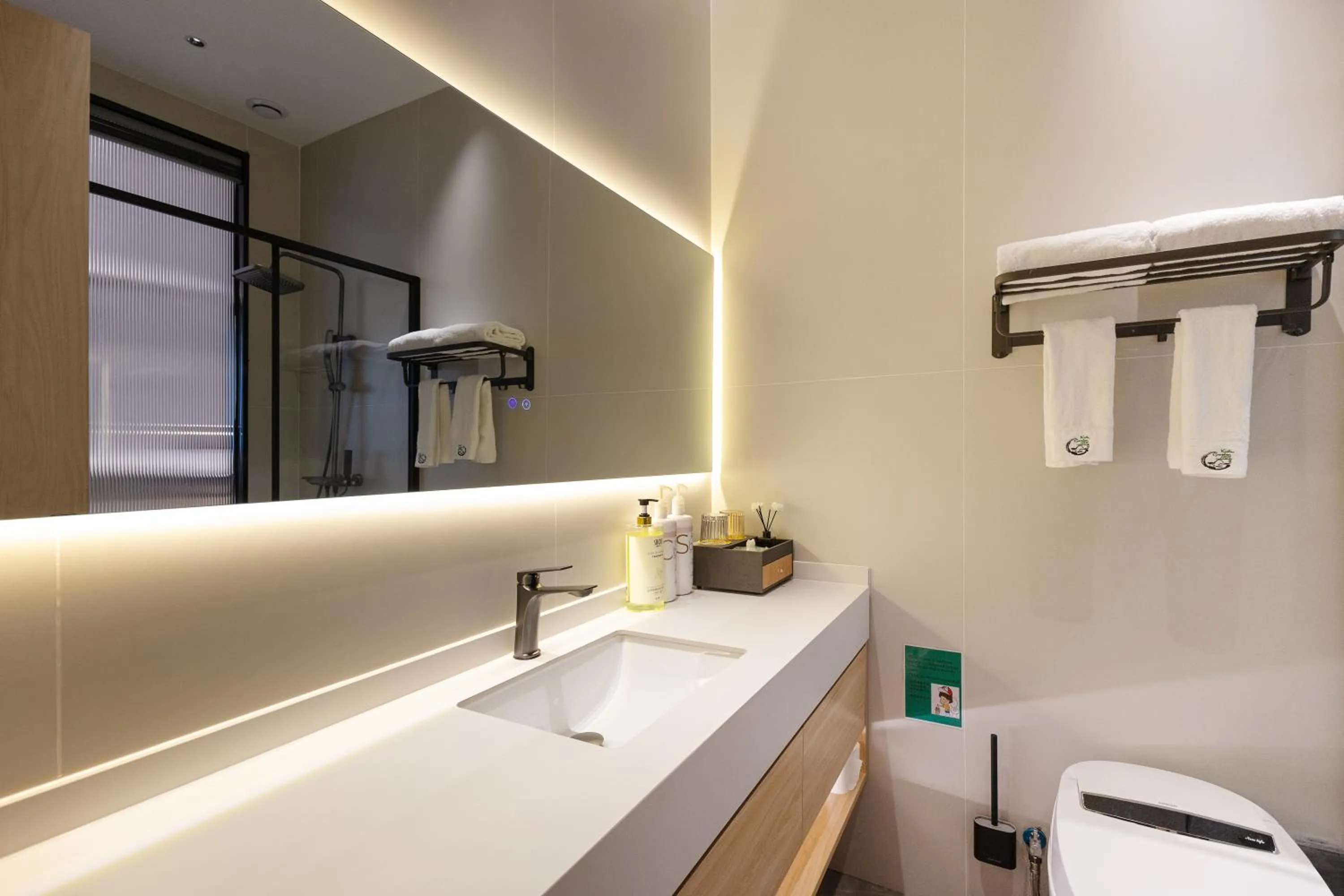 Toilet in Xishu Garden Inn - Travel Agency service - Car Rent service - English Speaking