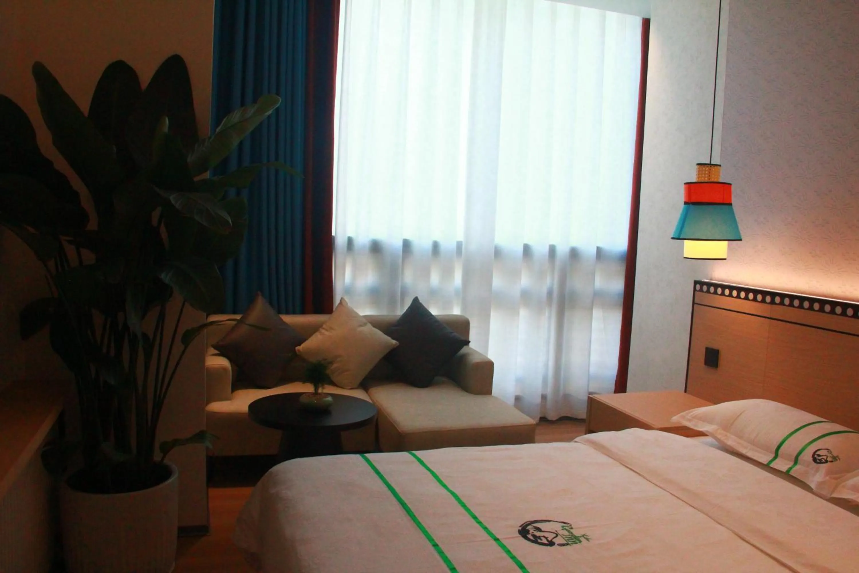 Bed in Xishu Garden Inn - Travel Agency service - Car Rent service - English Speaking