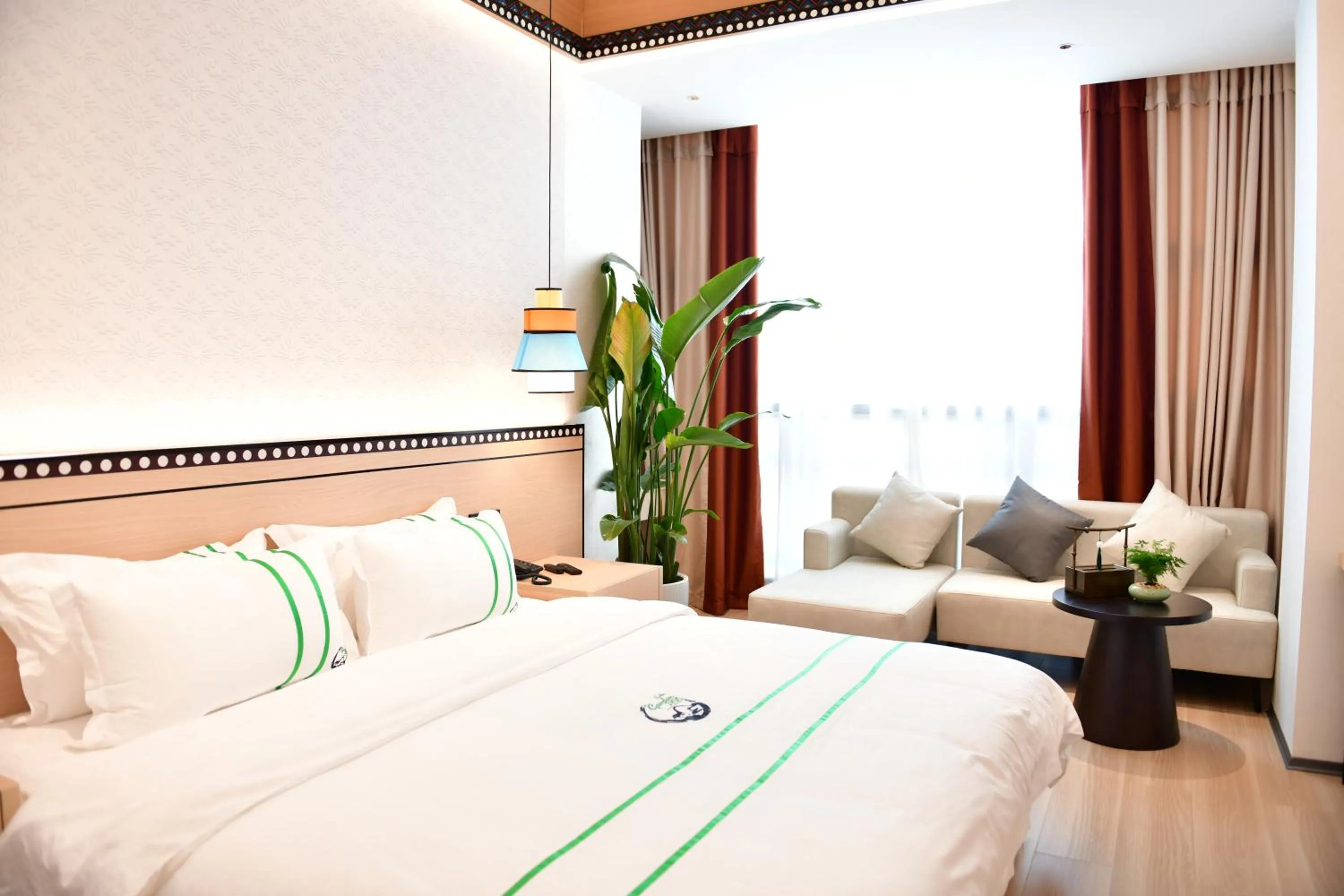 Bed in Xishu Garden Inn - Travel Agency service - Car Rent service - English Speaking