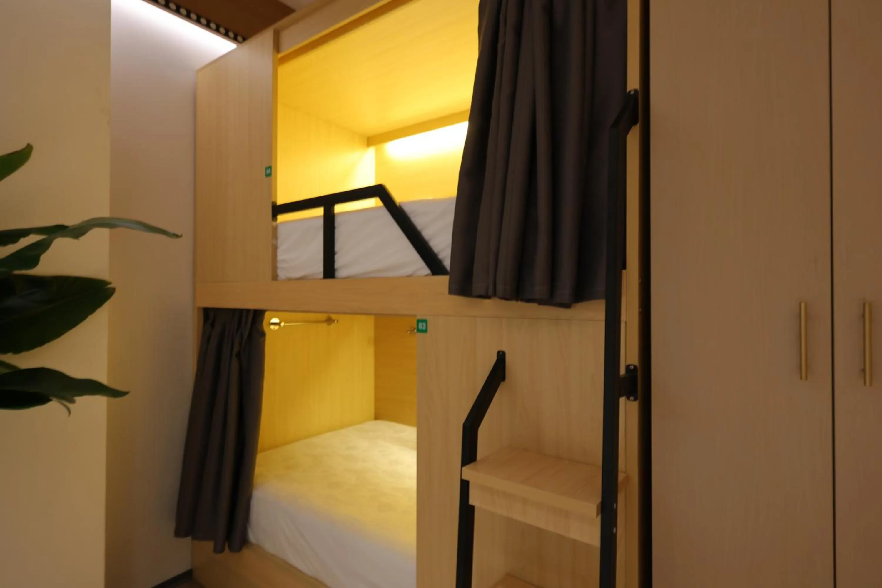 bunk bed, Bed in Xishu Garden Inn - Travel Agency service - Car Rent service - English Speaking
