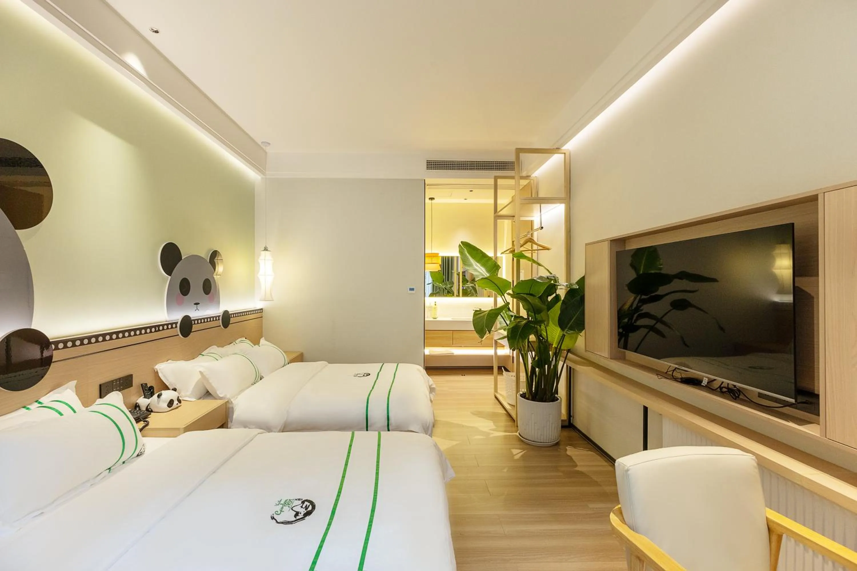 Photo of the whole room, Bed in Xishu Garden Inn - Travel Agency service - Car Rent service - English Speaking