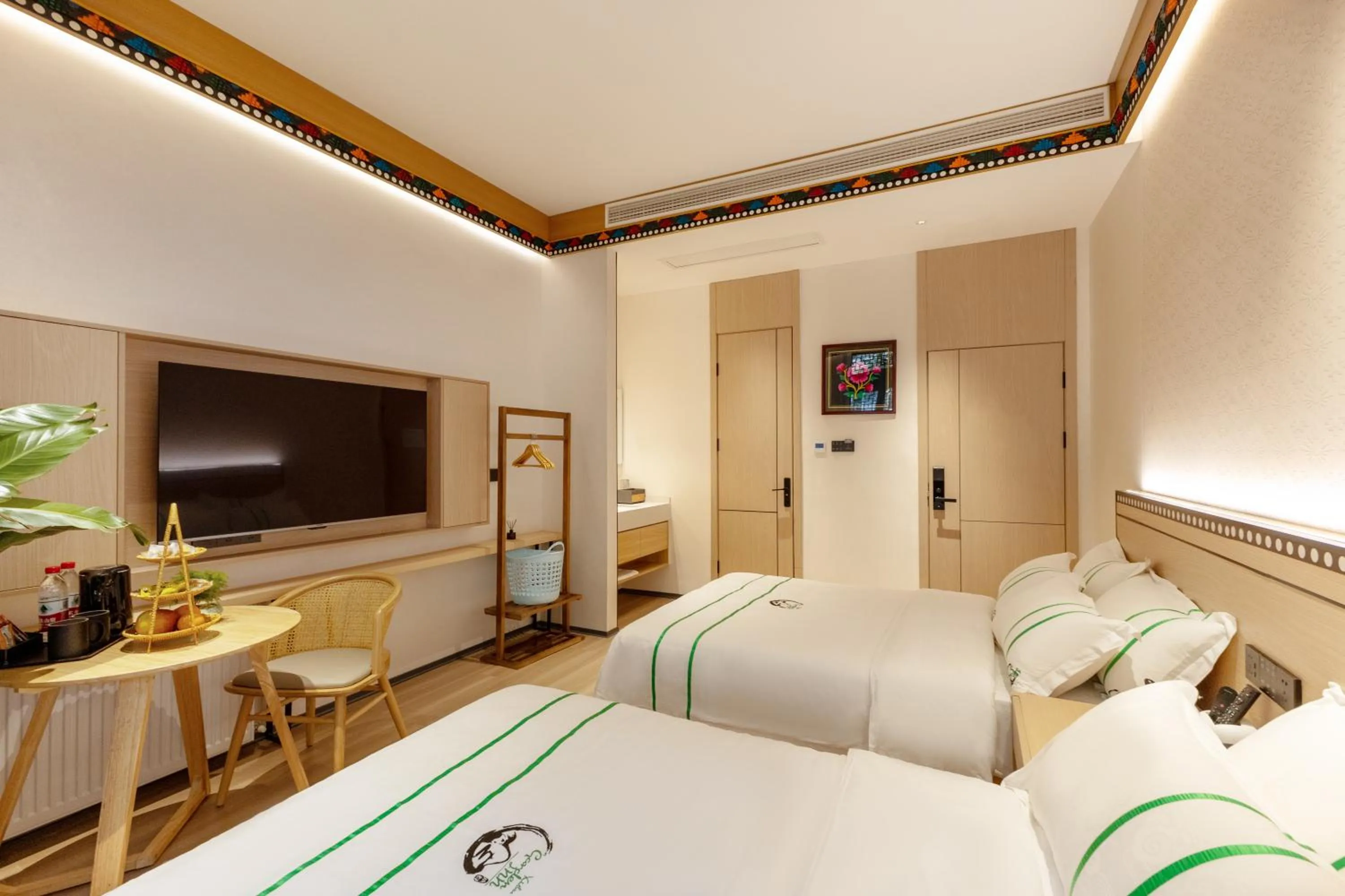 Bedroom, Bed in Xishu Garden Inn - Travel Agency service - Car Rent service - English Speaking