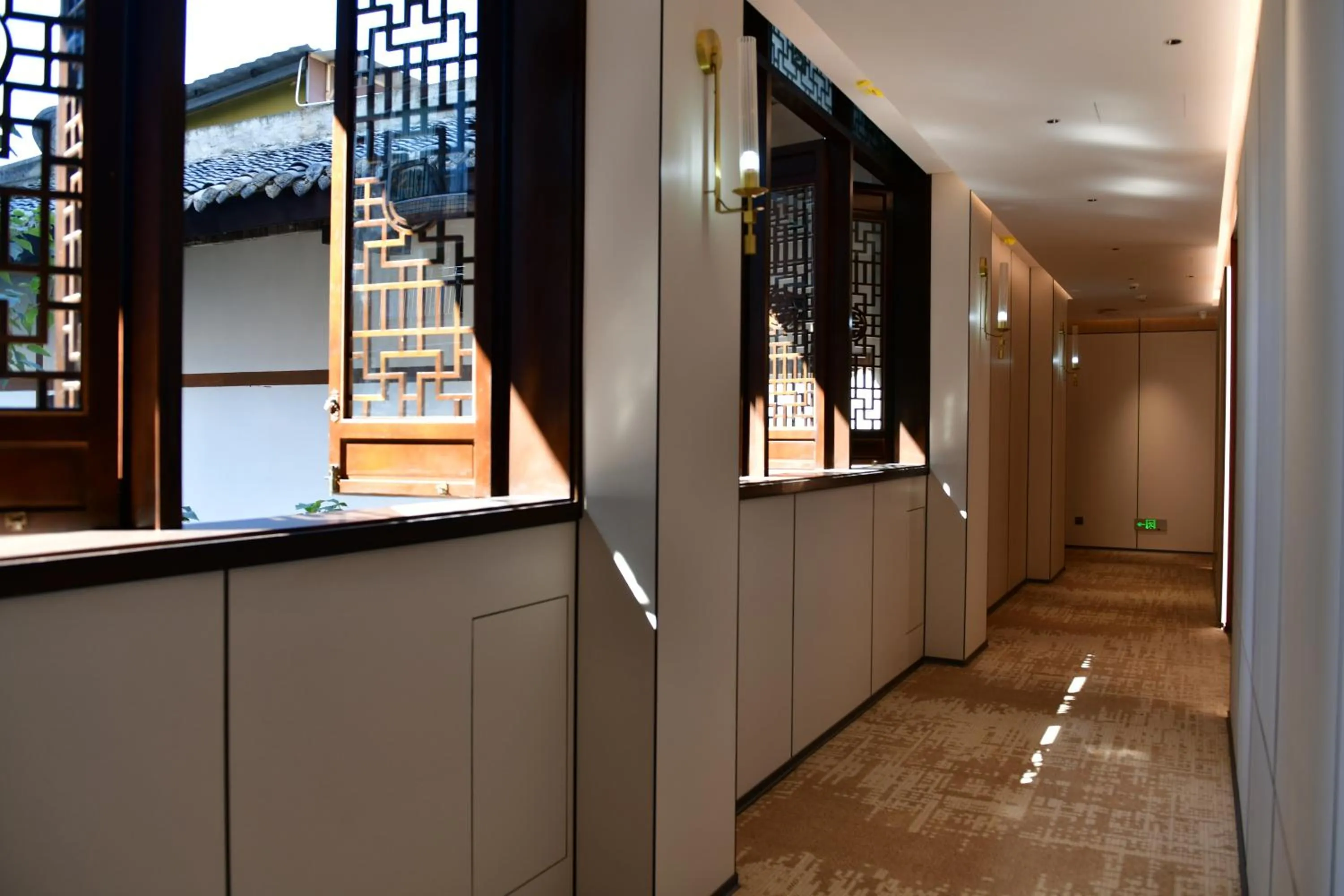 Property building in Xishu Garden Inn - Travel Agency service - Car Rent service - English Speaking