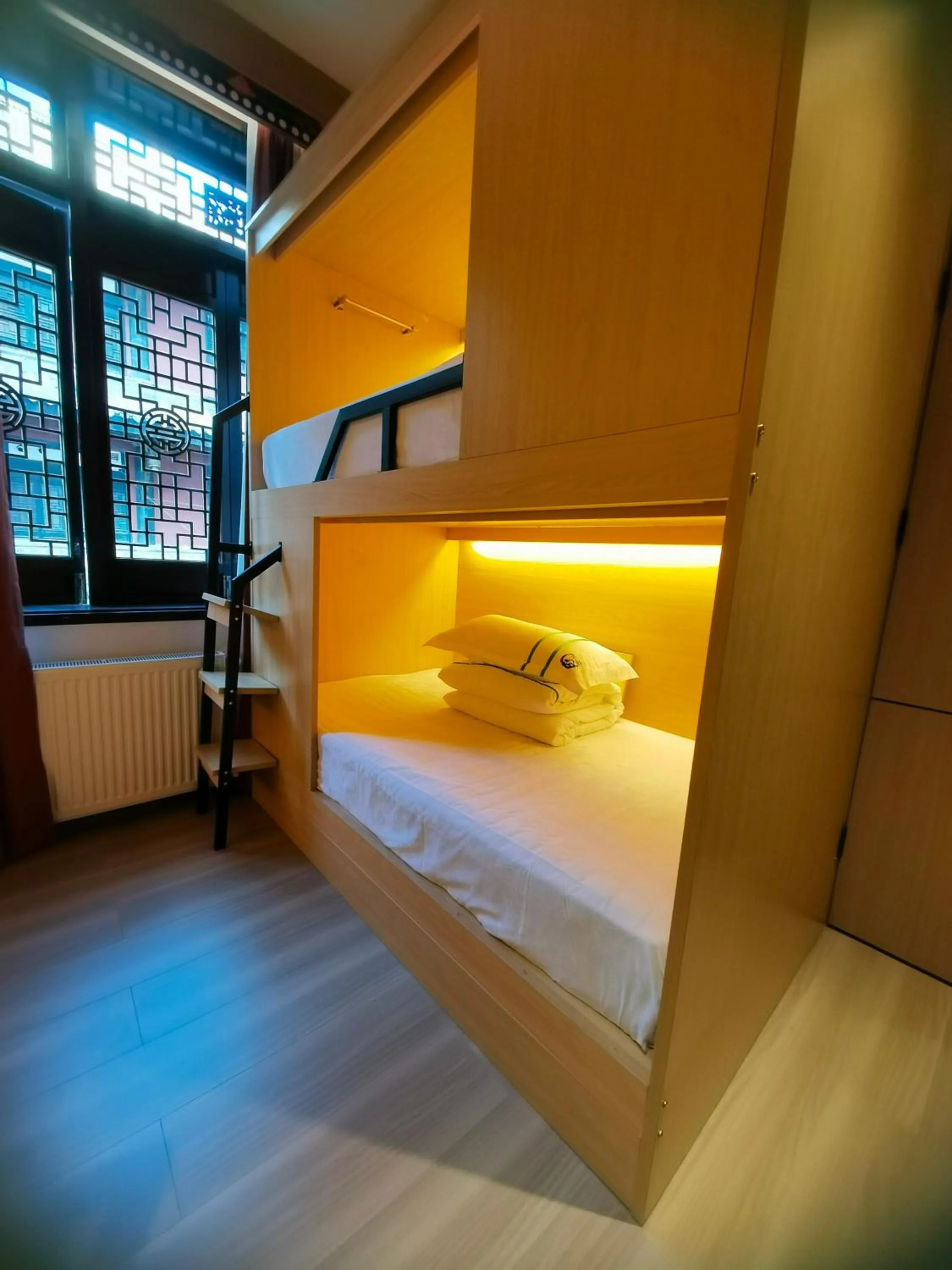 bunk bed, Bed in Xishu Garden Inn - Travel Agency service - Car Rent service - English Speaking