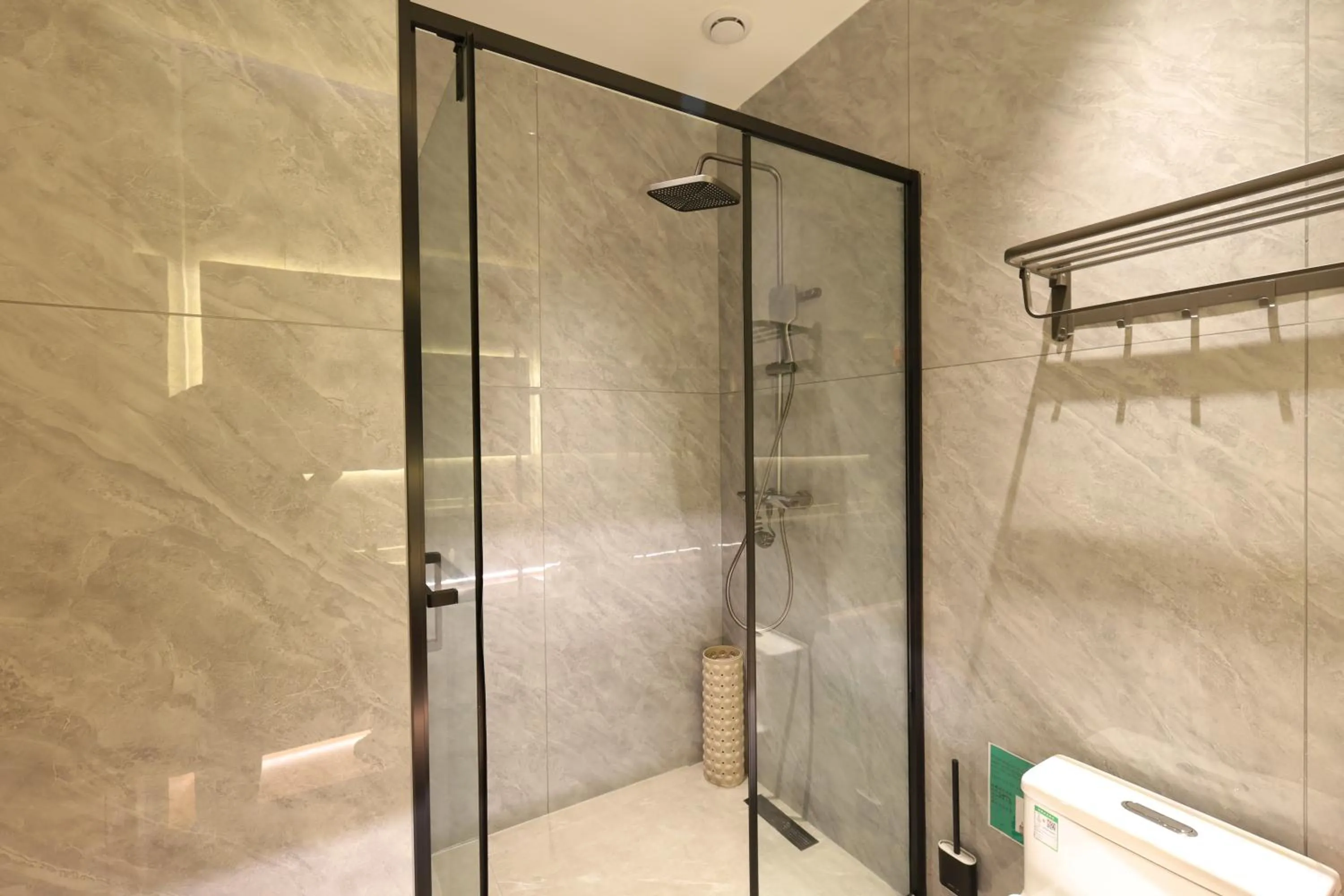 Shower in Xishu Garden Inn - Travel Agency service - Car Rent service - English Speaking