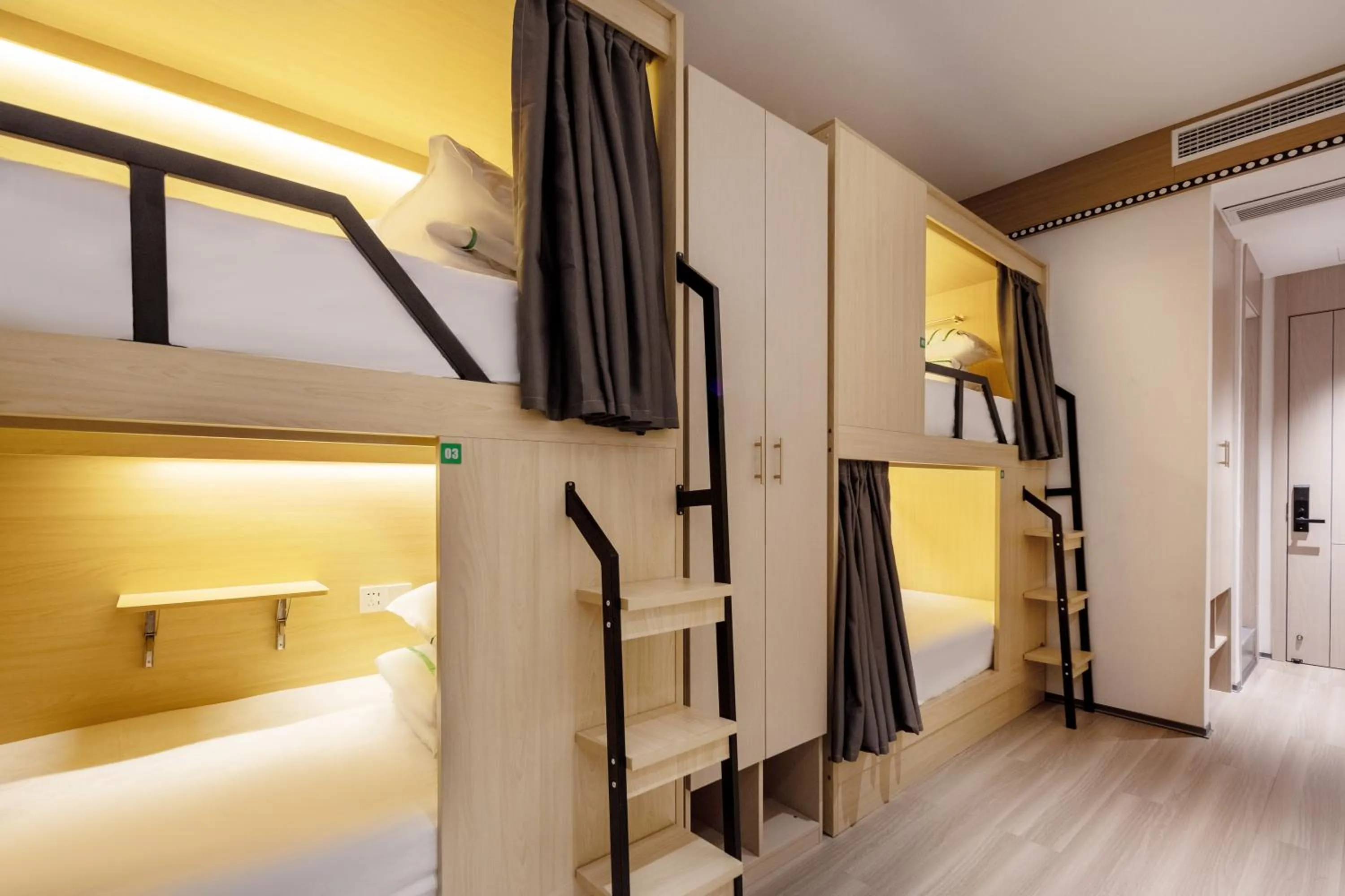 bunk bed, Bed in Xishu Garden Inn - Travel Agency service - Car Rent service - English Speaking