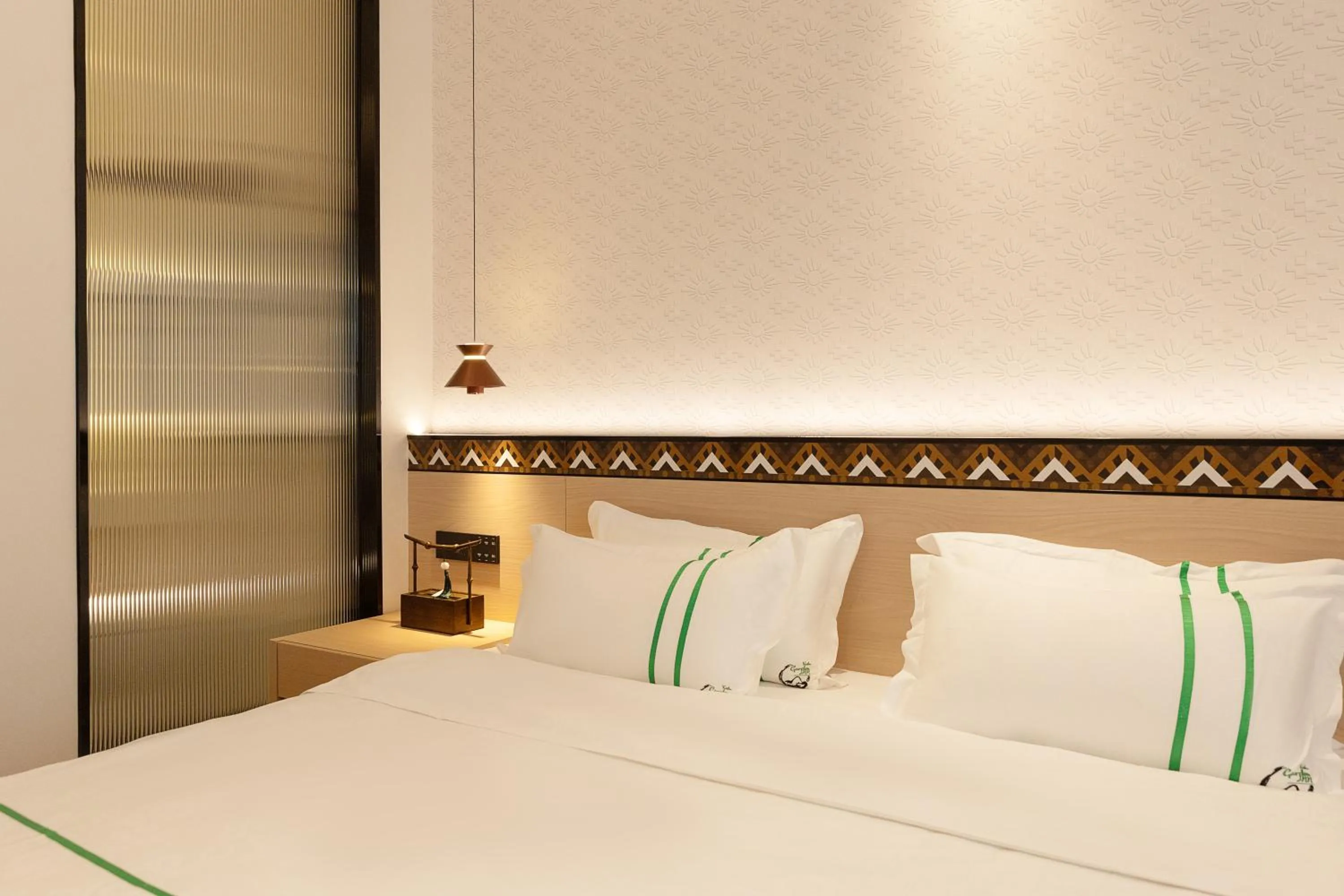 Bed in Xishu Garden Inn - Travel Agency service - Car Rent service - English Speaking