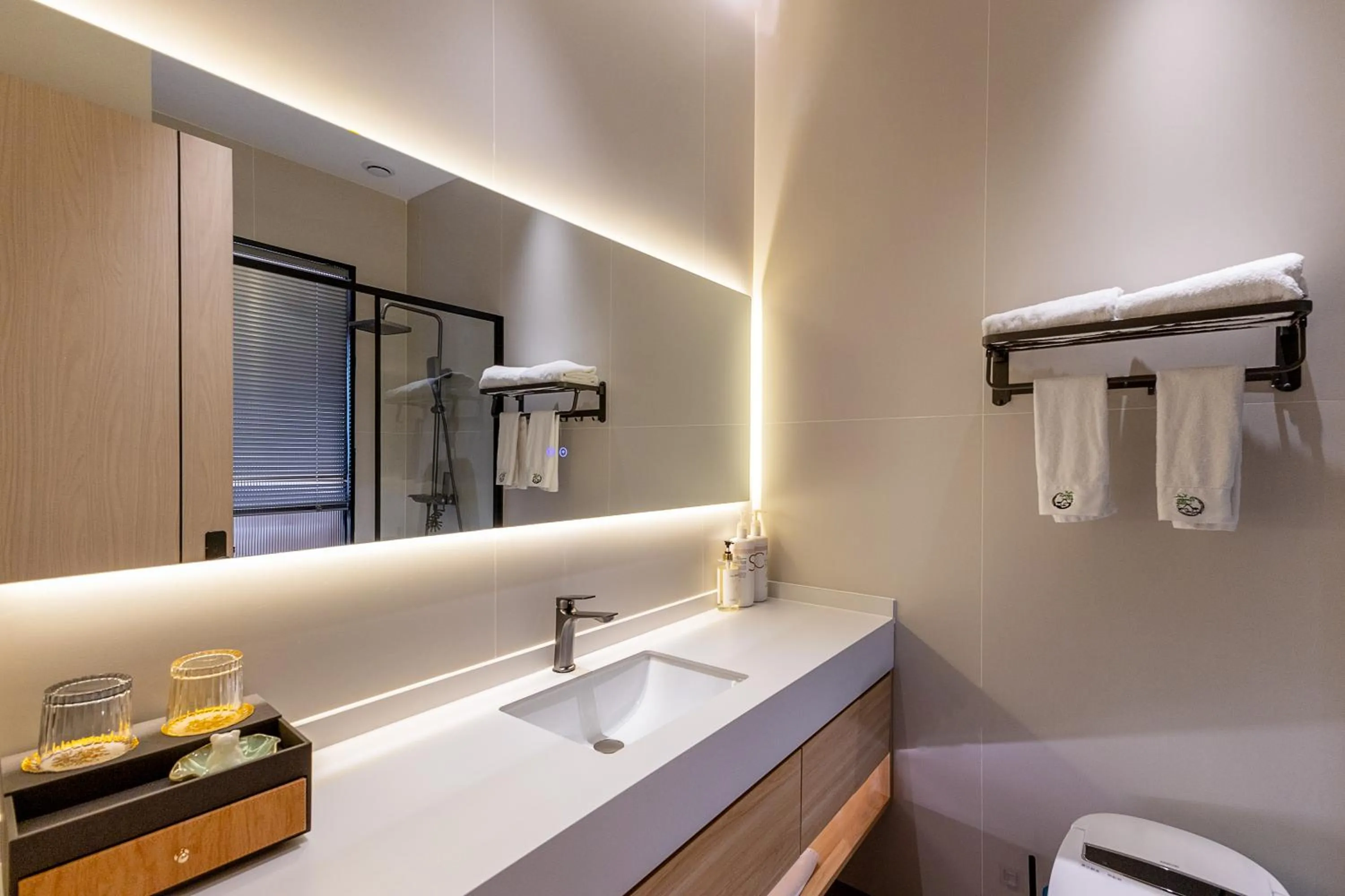 Bathroom in Xishu Garden Inn - Travel Agency service - Car Rent service - English Speaking