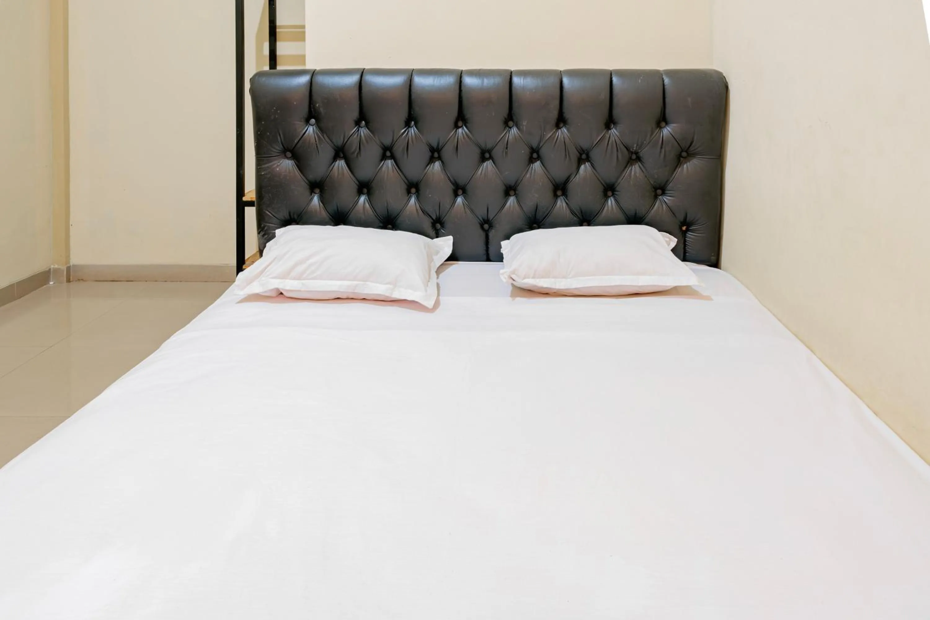 Bedroom in Hotel O Rinjani Guest House