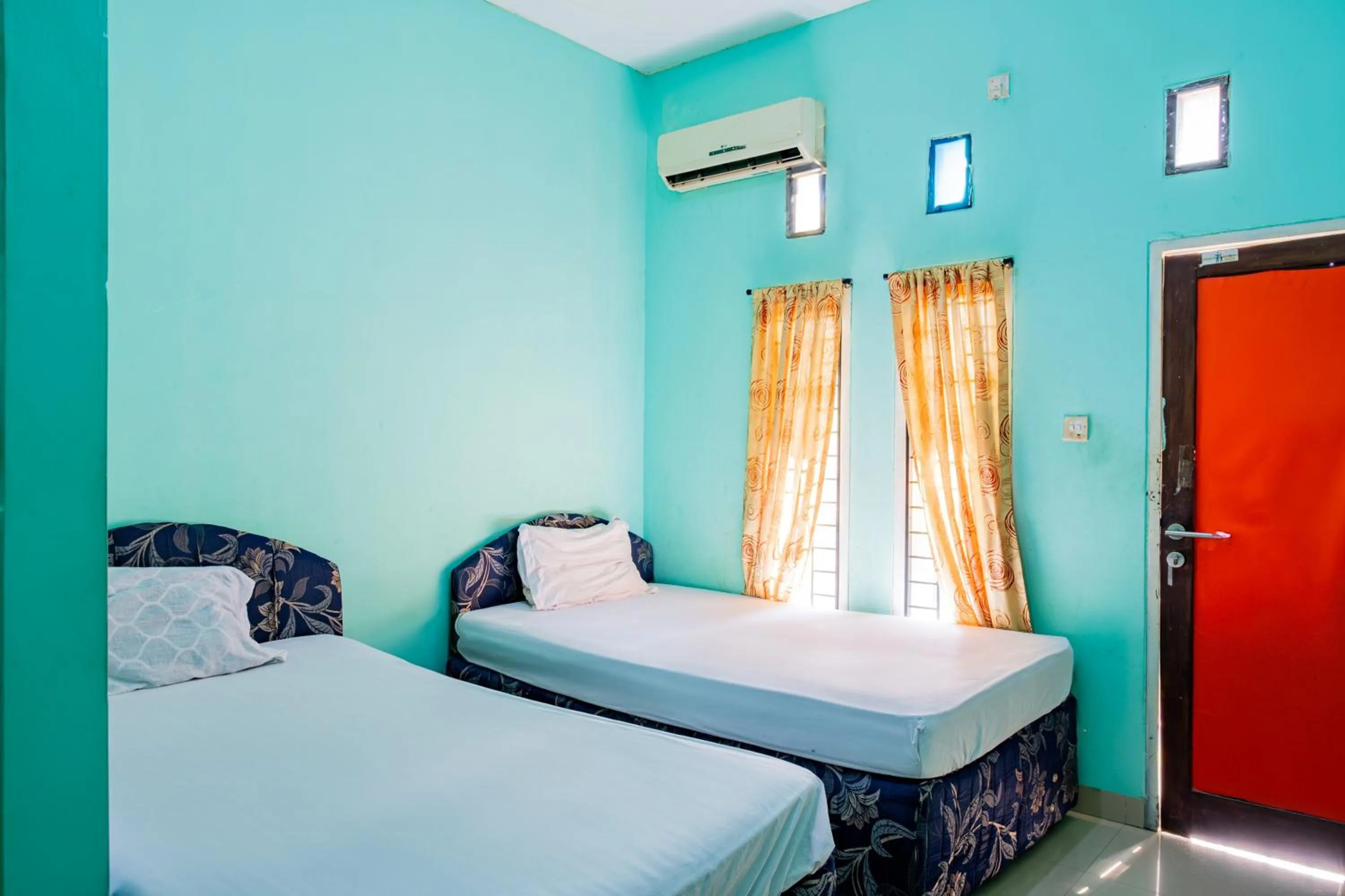 Bedroom in Hotel O Rinjani Guest House
