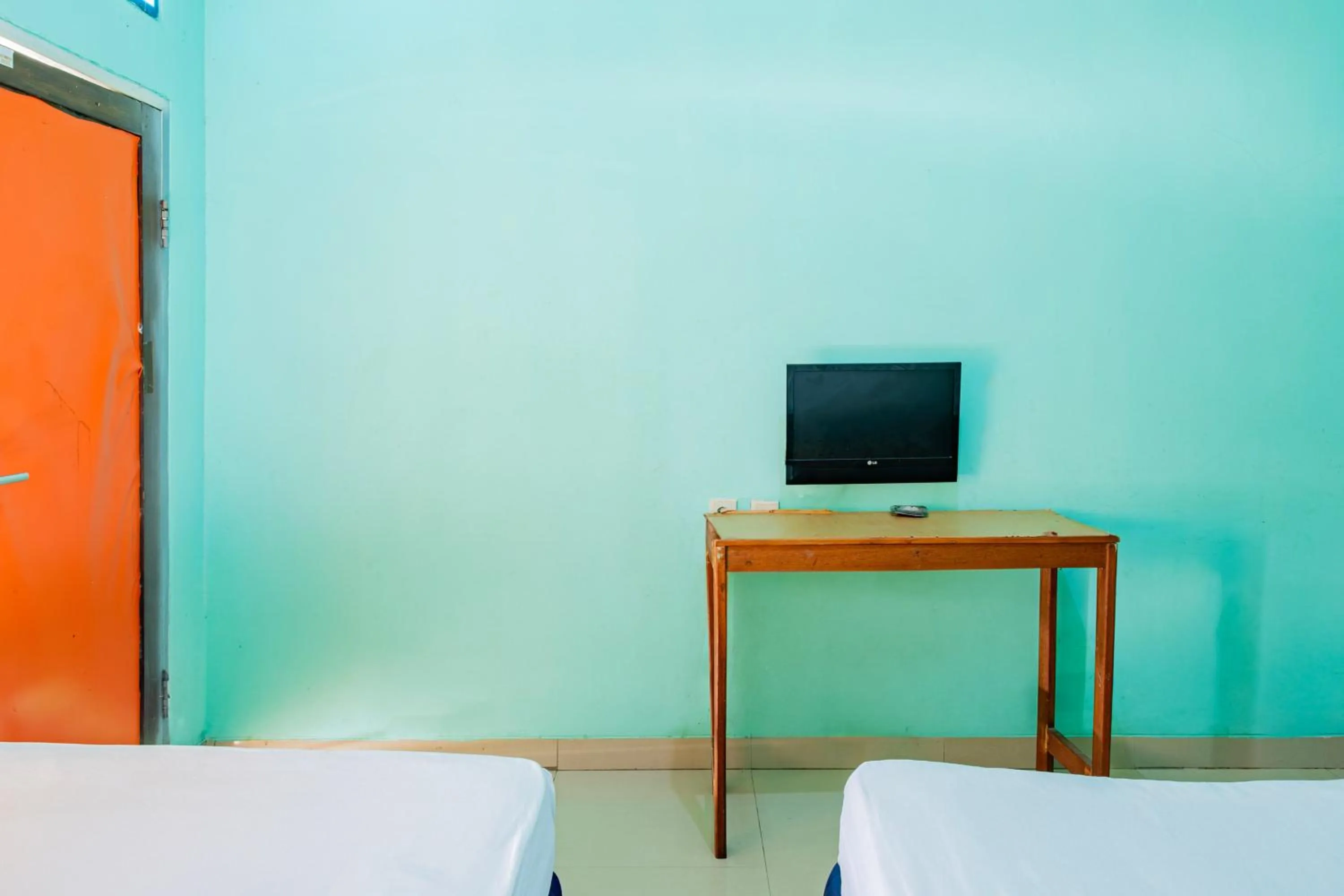 Bedroom in Hotel O Rinjani Guest House