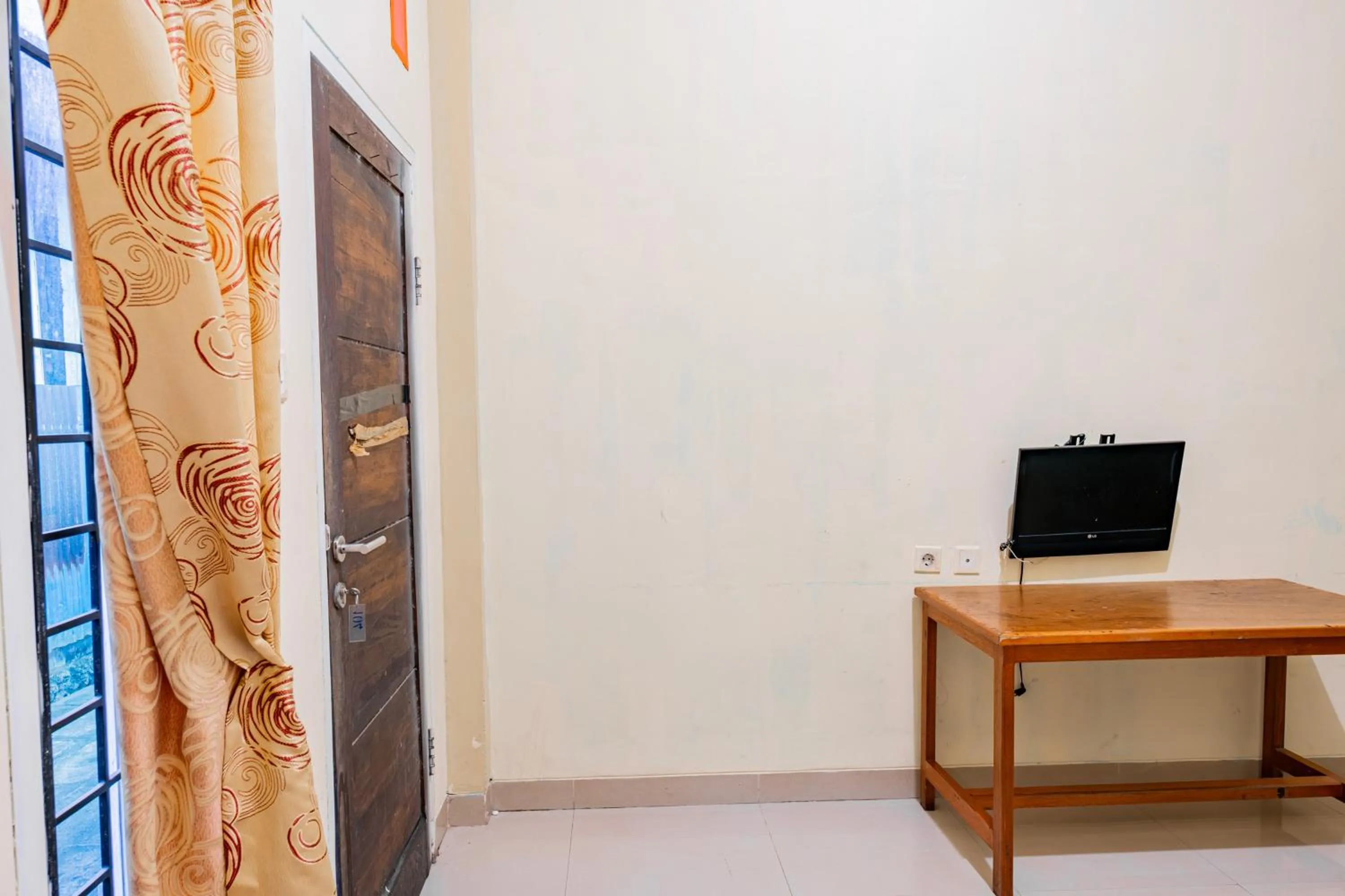 Bedroom in Hotel O Rinjani Guest House