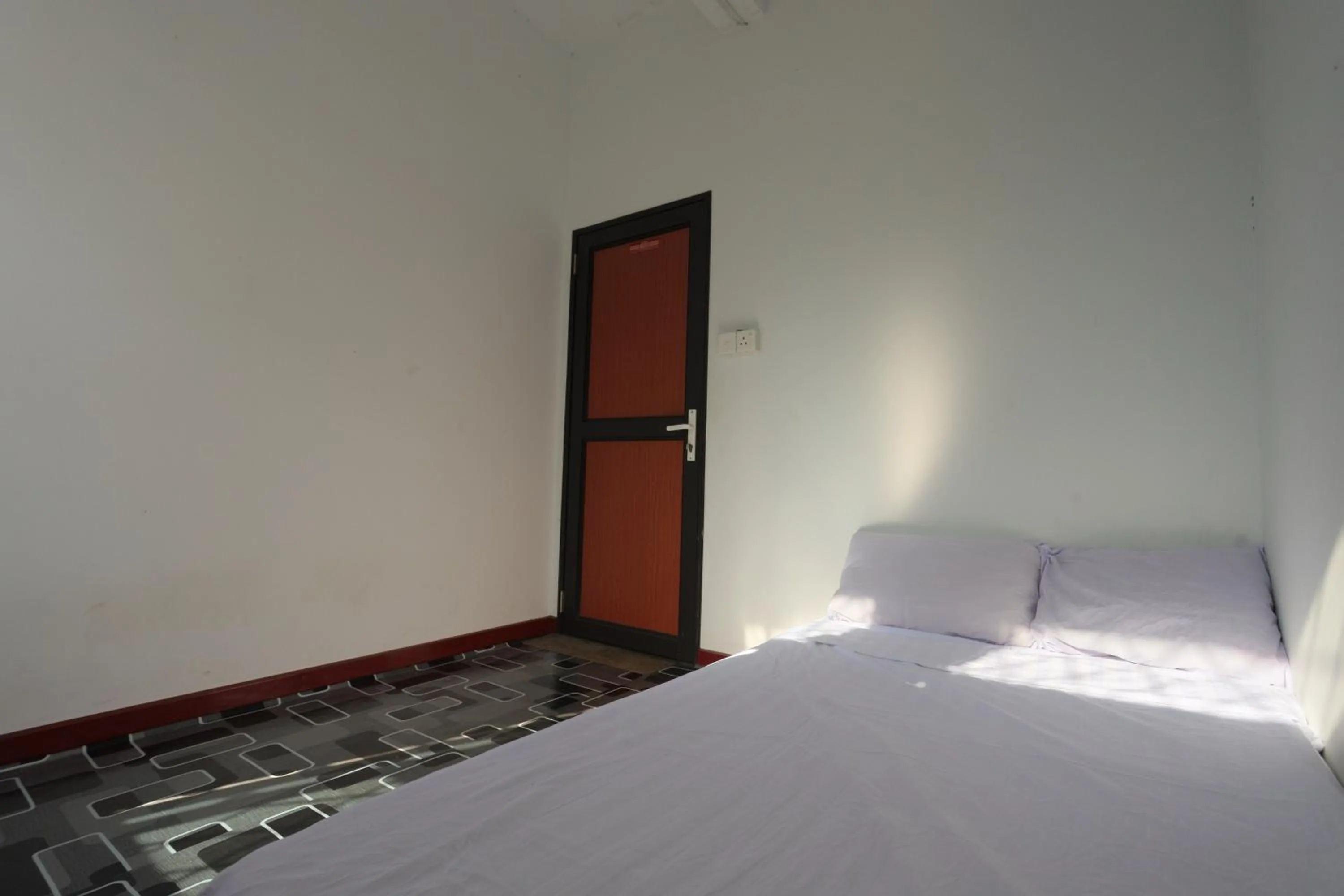 Bedroom in Hotel O Homestay OrangeNearNagoya Hill Shopping Mall