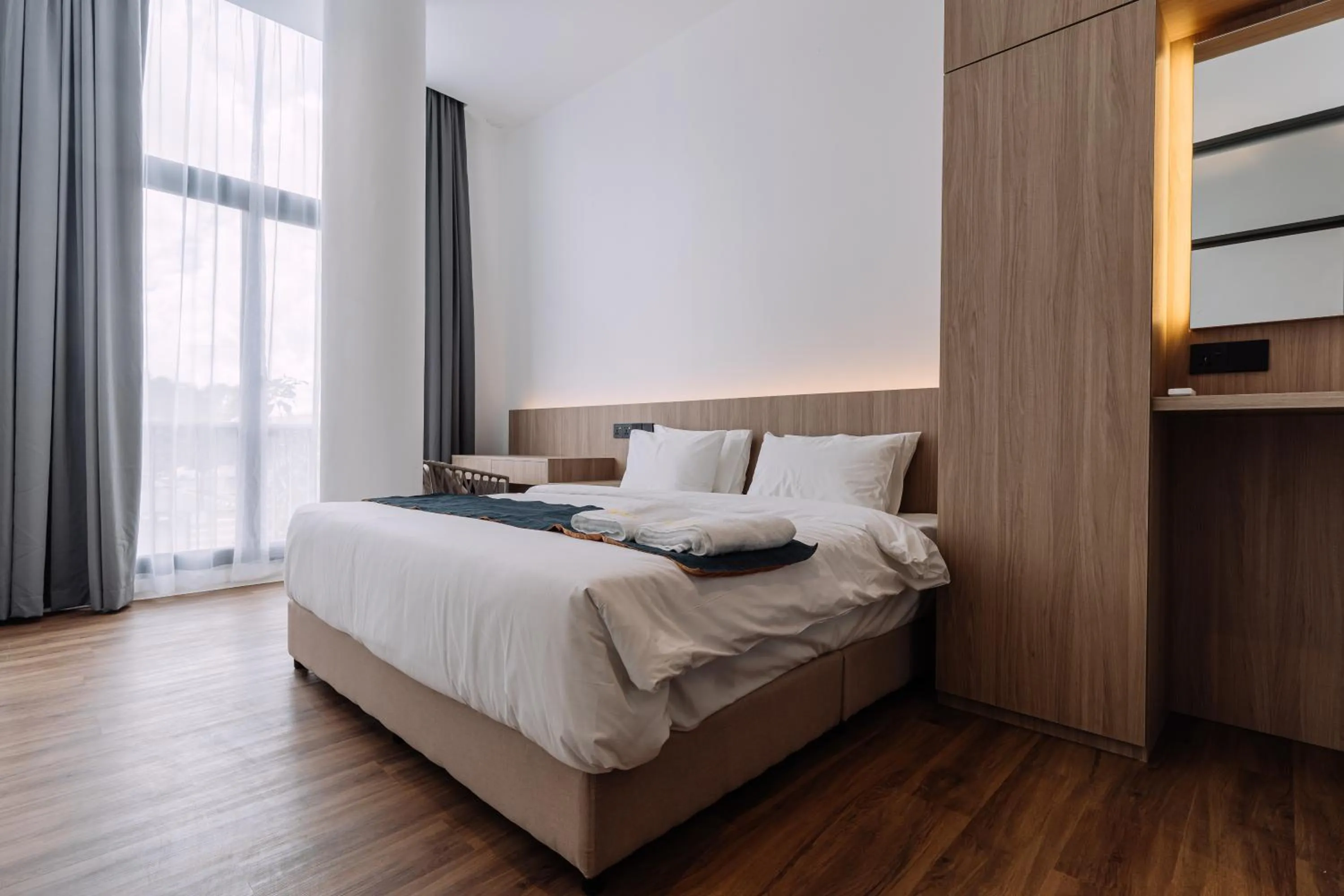 Bedroom, Bed in Impiana by Roxy Hotel