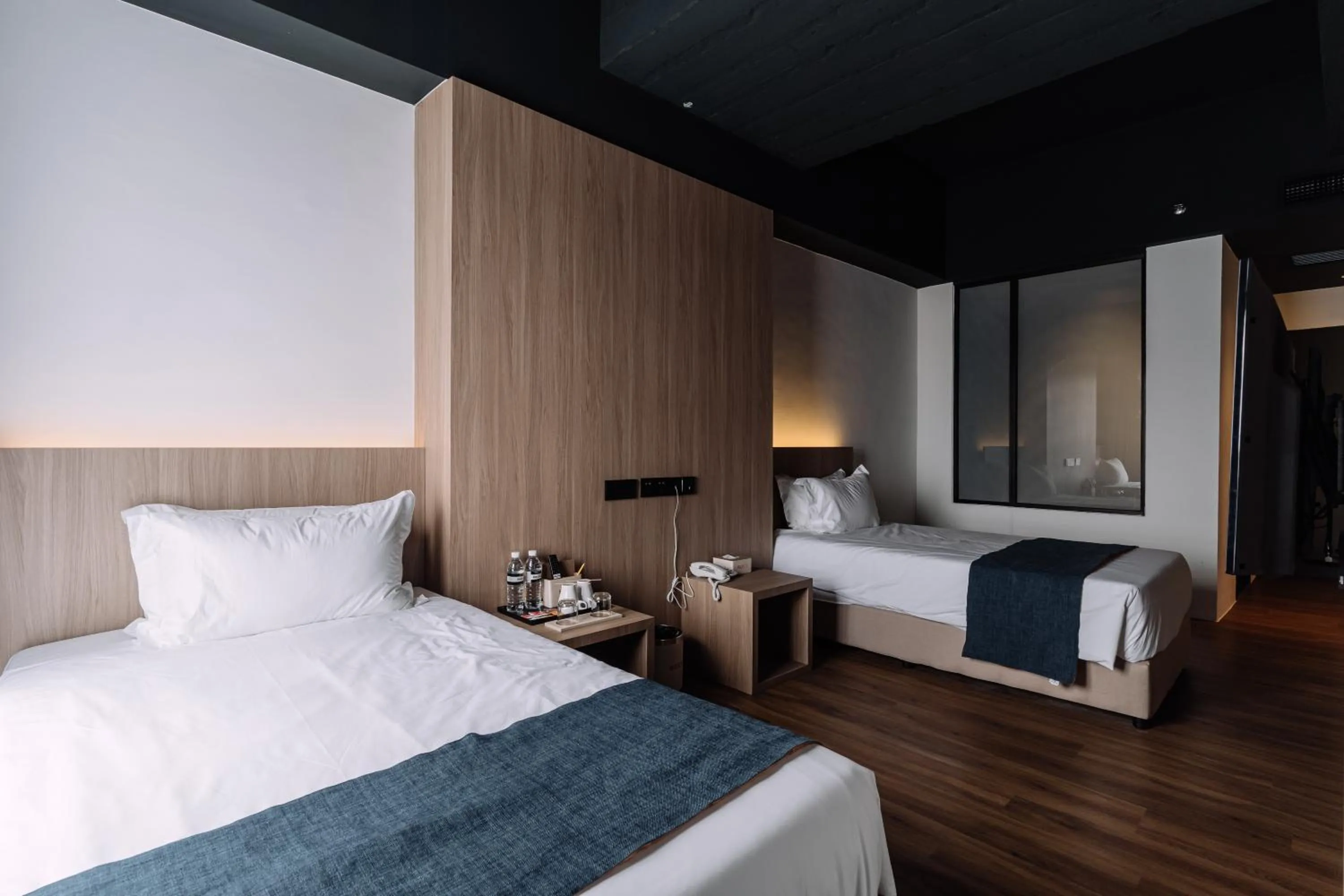 Bedroom, Bed in Impiana by Roxy Hotel