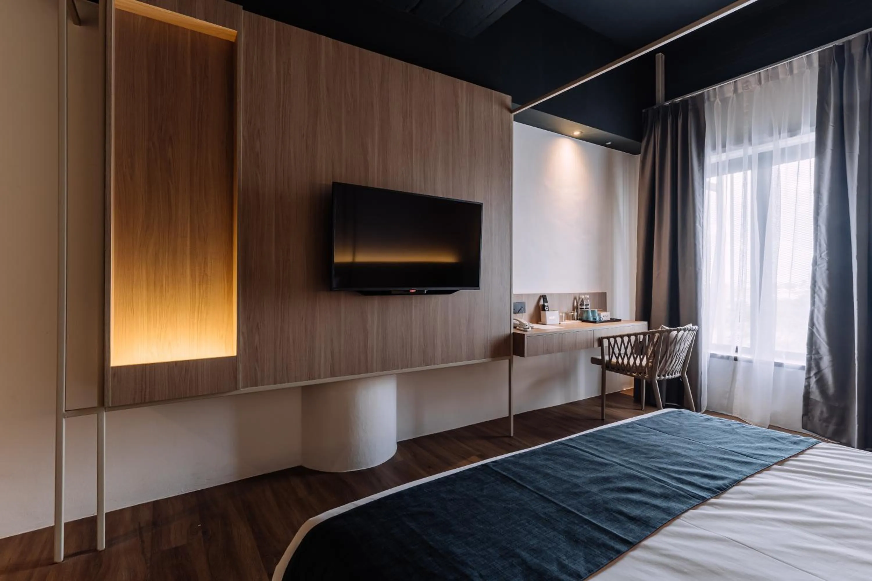 Bedroom, Bed in Impiana by Roxy Hotel