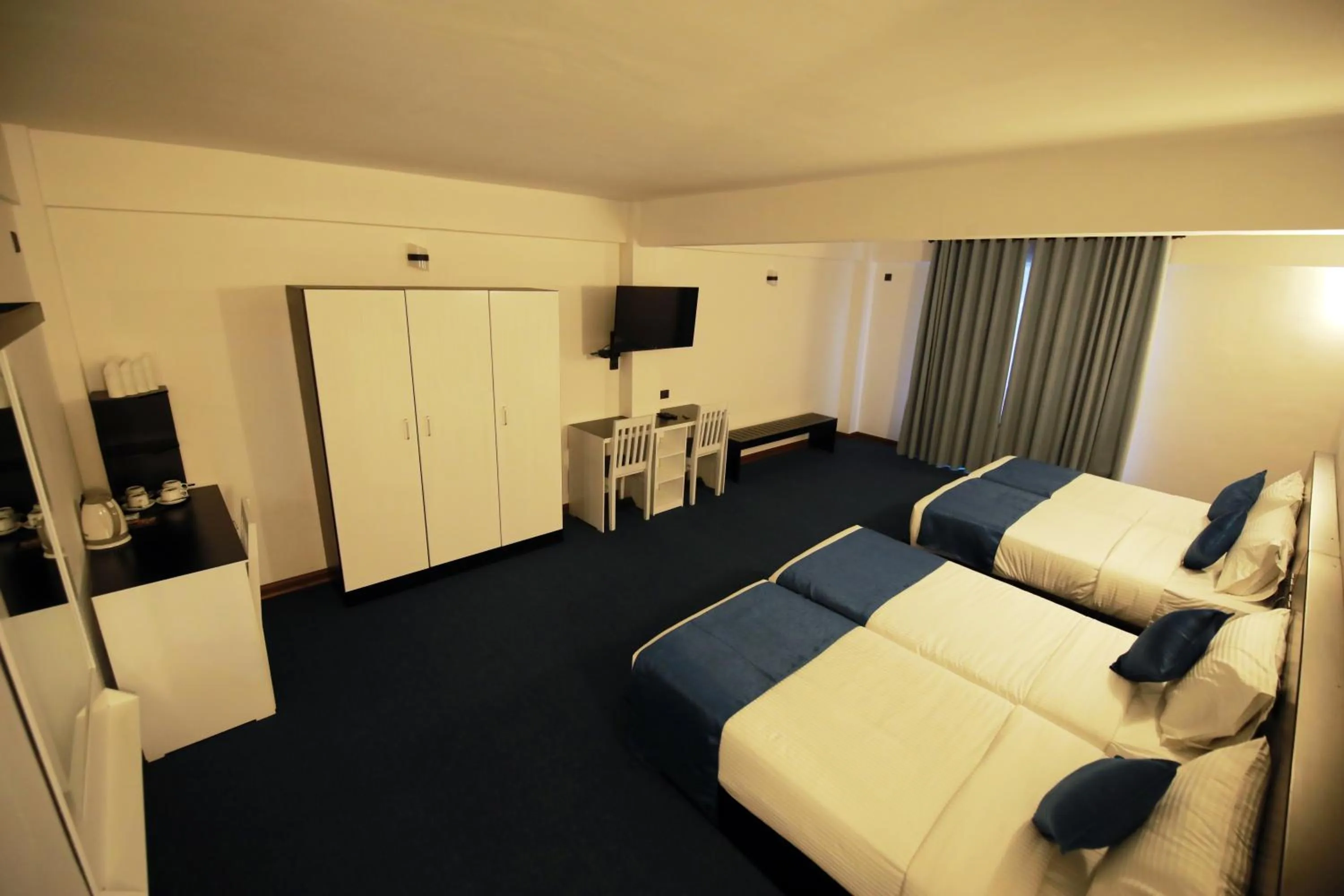 Bed in Single Tree Mount Hotel