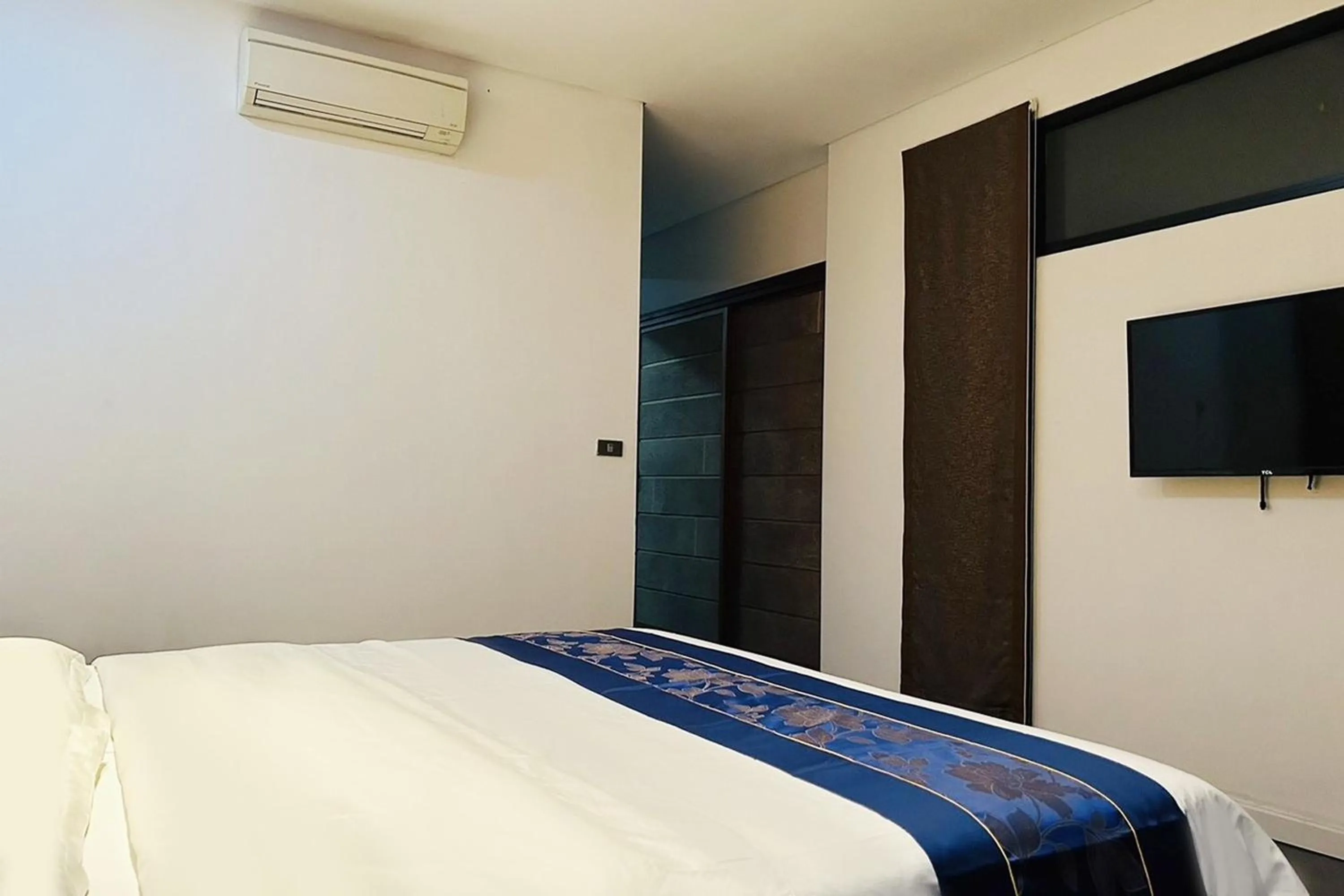 Bed in Thai Good Arts Resort