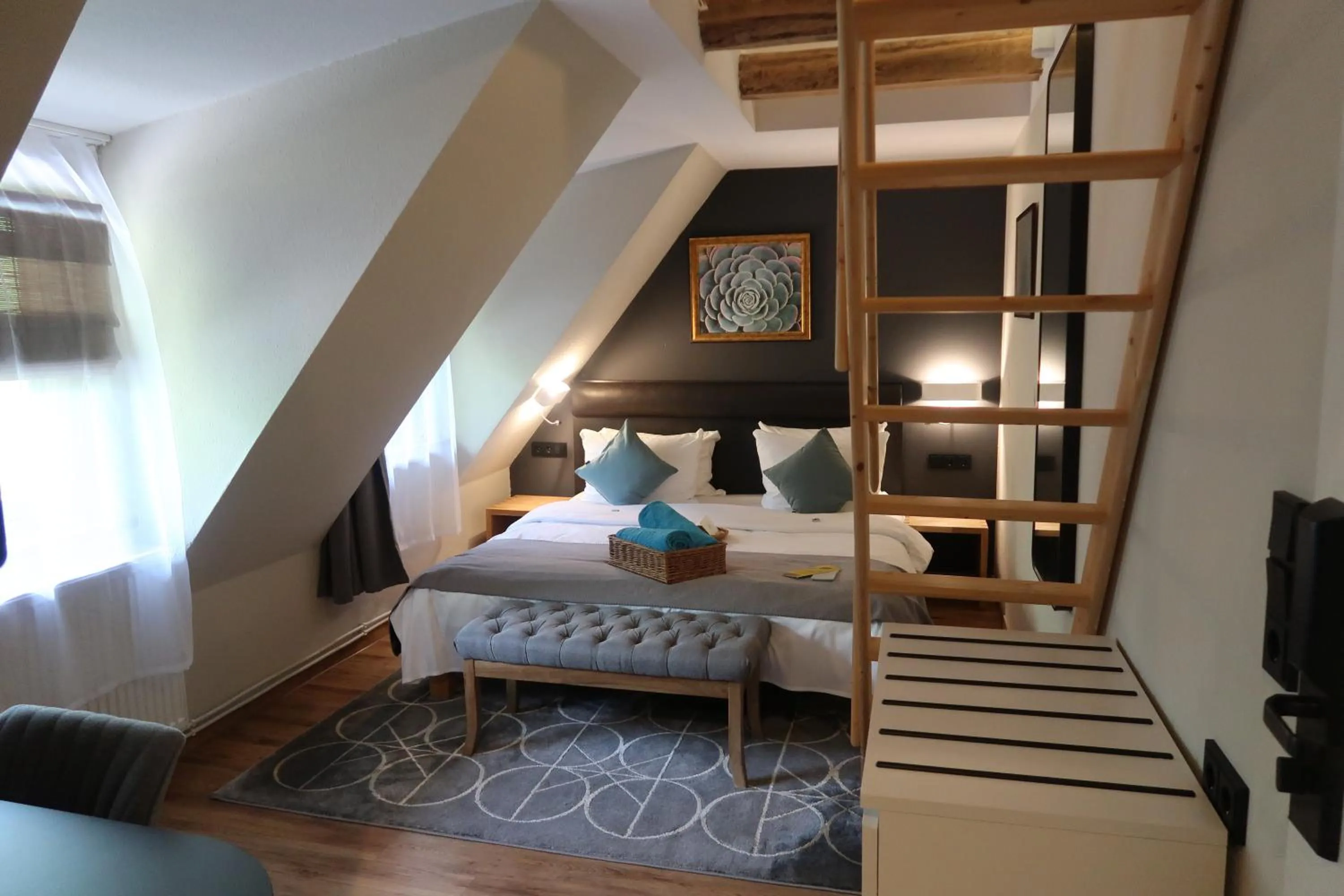 Photo of the whole room, Bed in Lodge Seaside Boutique Hotel